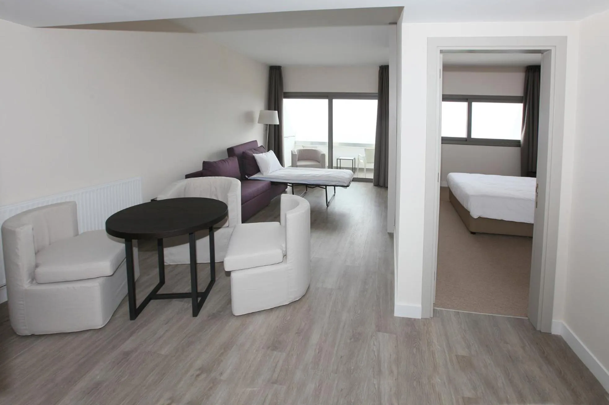 Living room, Bed in Droushia Heights Hotel