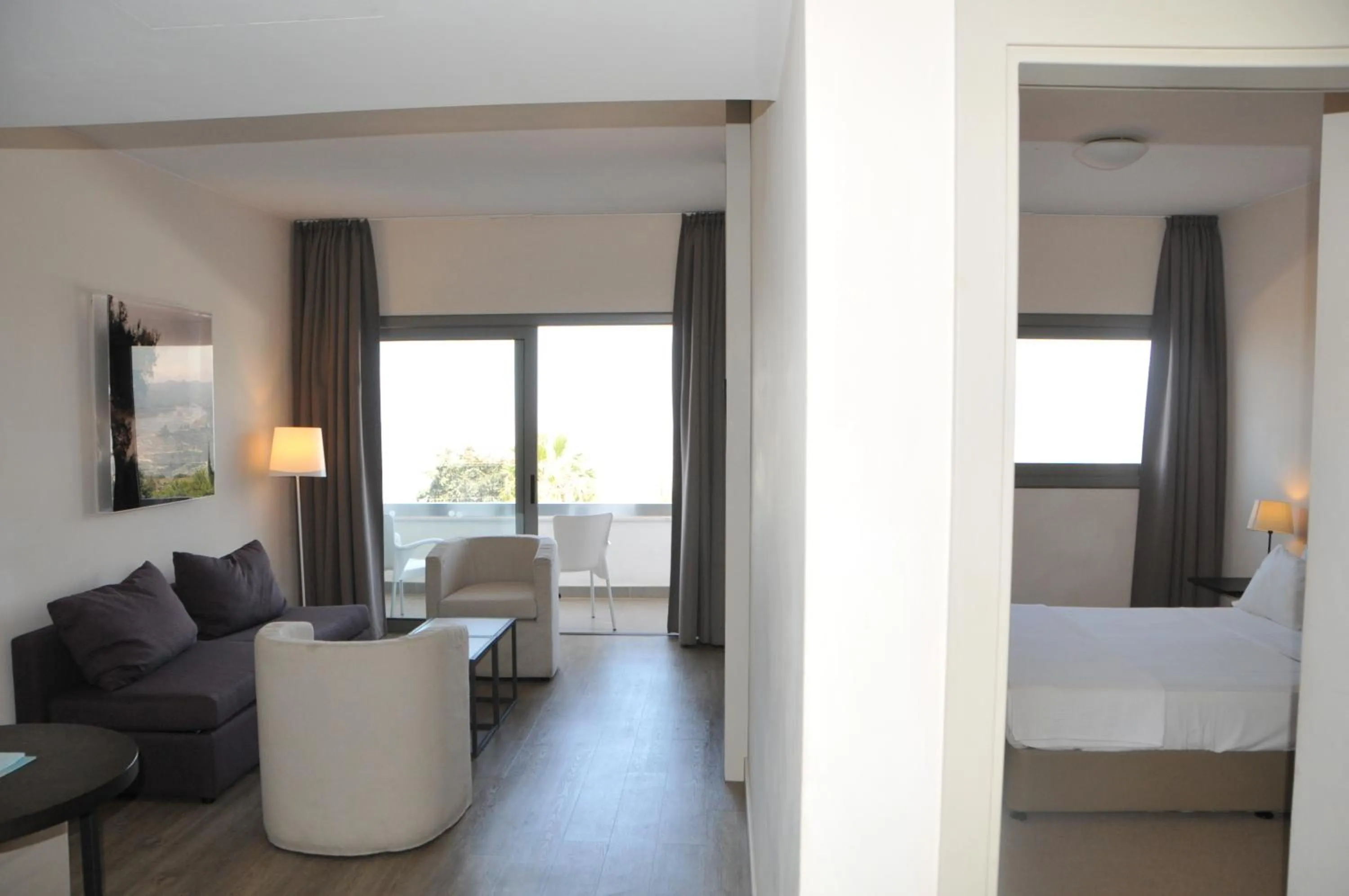 Living room, Bed in Droushia Heights Hotel