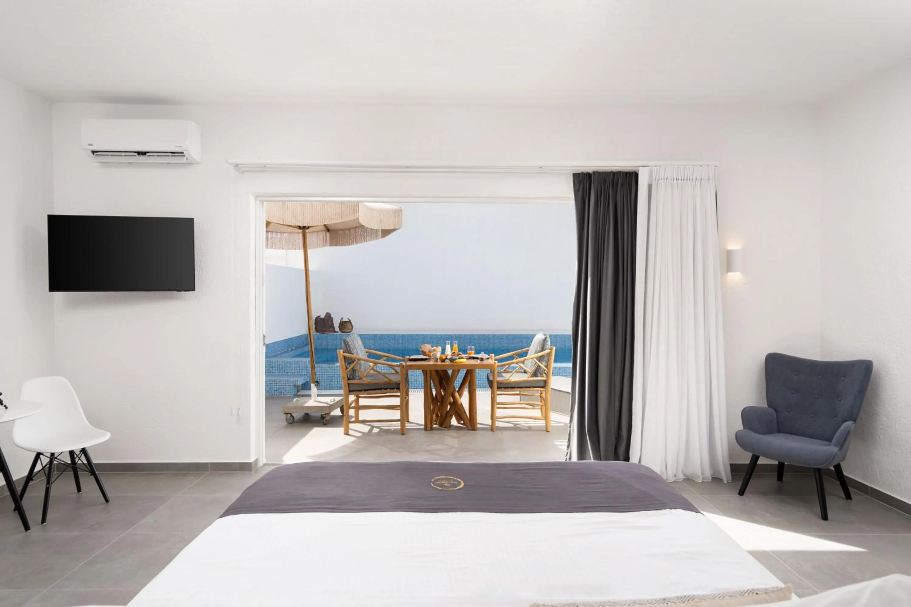 Bedroom in Aegean Melody Suites & Villas
