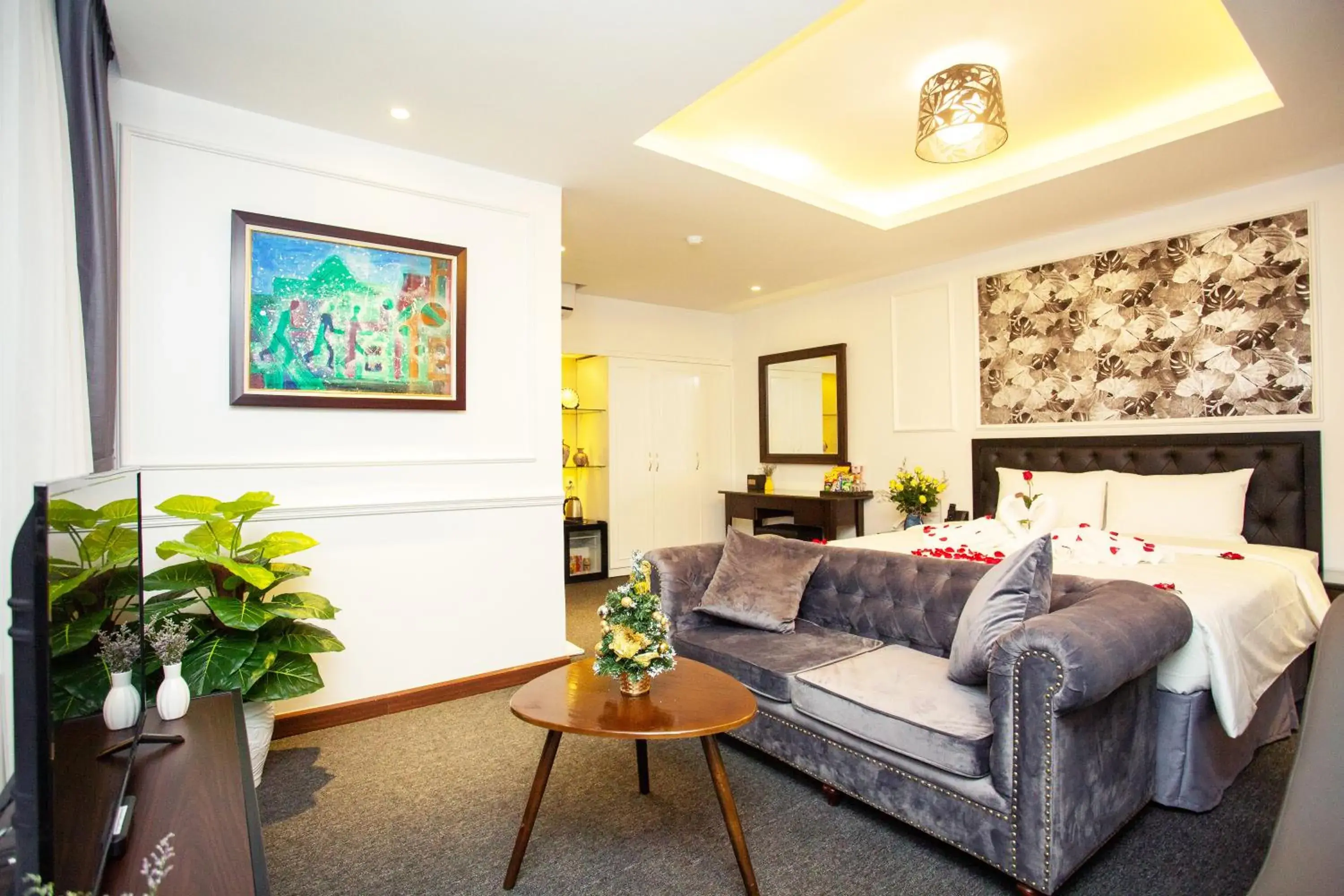 Communal lounge/ TV room, Bed in Adeline Hotel Hanoi Communal lounge/ TV room, Bed in Adeline Hotel Hanoi