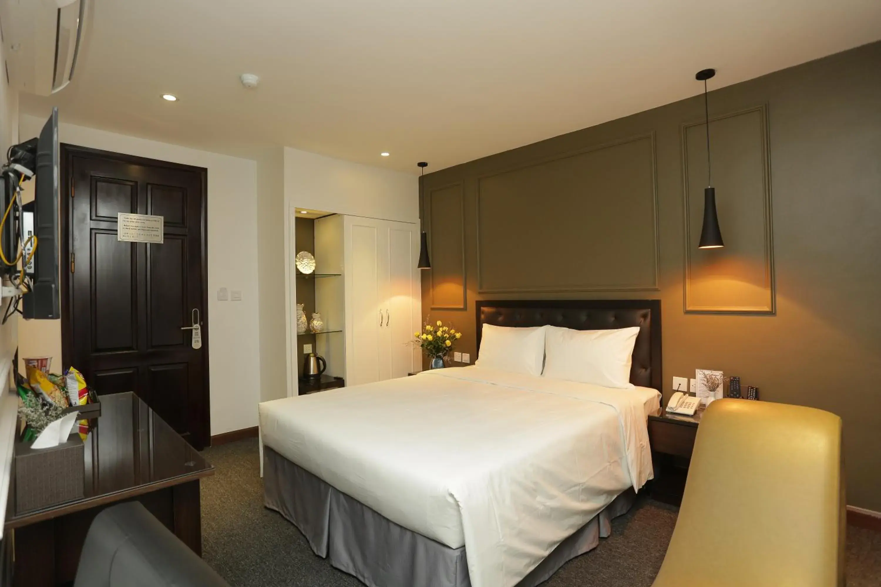 Communal lounge/ TV room, Bed in Adeline Hotel Hanoi Communal lounge/ TV room, Bed in Adeline Hotel Hanoi