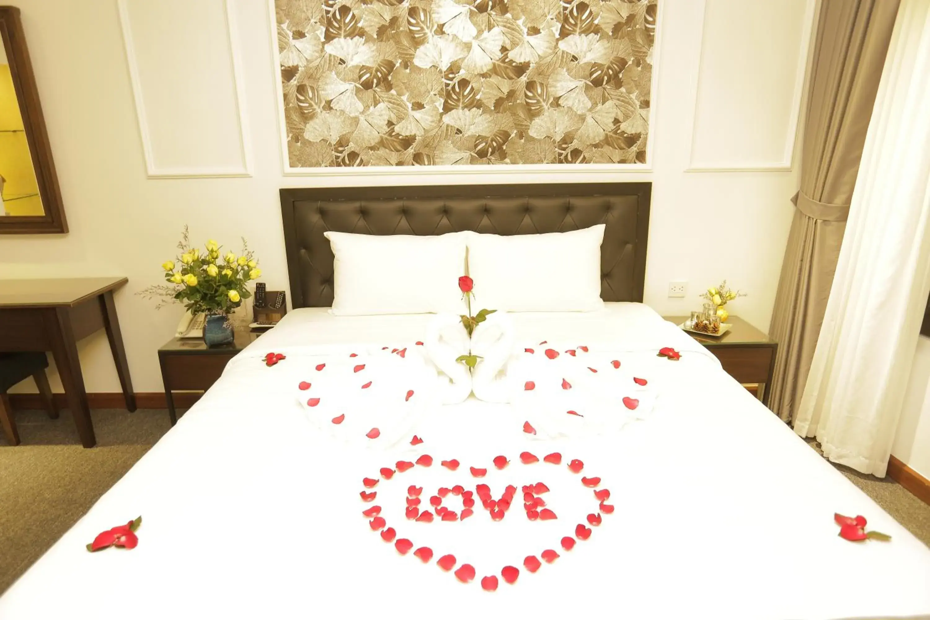 Communal lounge/ TV room, Bed in Adeline Hotel Hanoi Communal lounge/ TV room, Bed in Adeline Hotel Hanoi