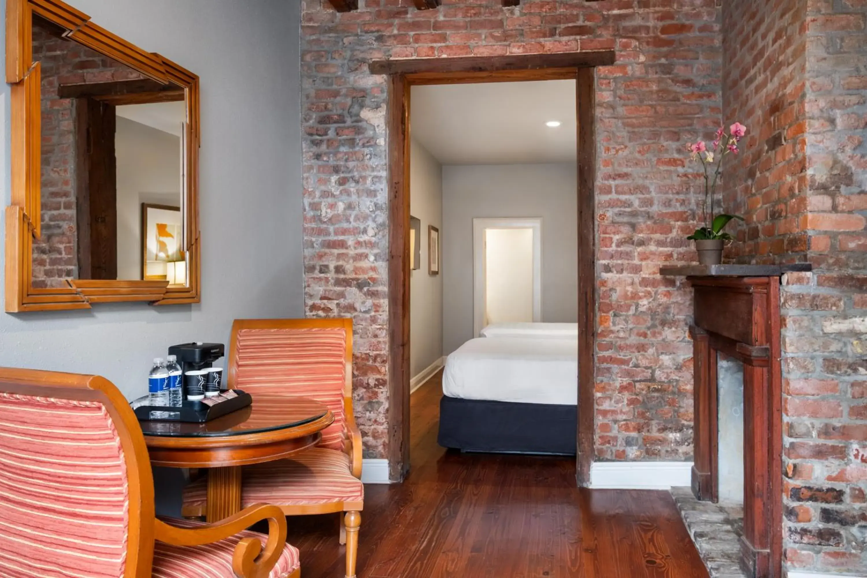 Living room, Bed in New Orleans Courtyard Hotel by the French Quarter Living room, Bed in New Orleans Courtyard Hotel by the French Quarter