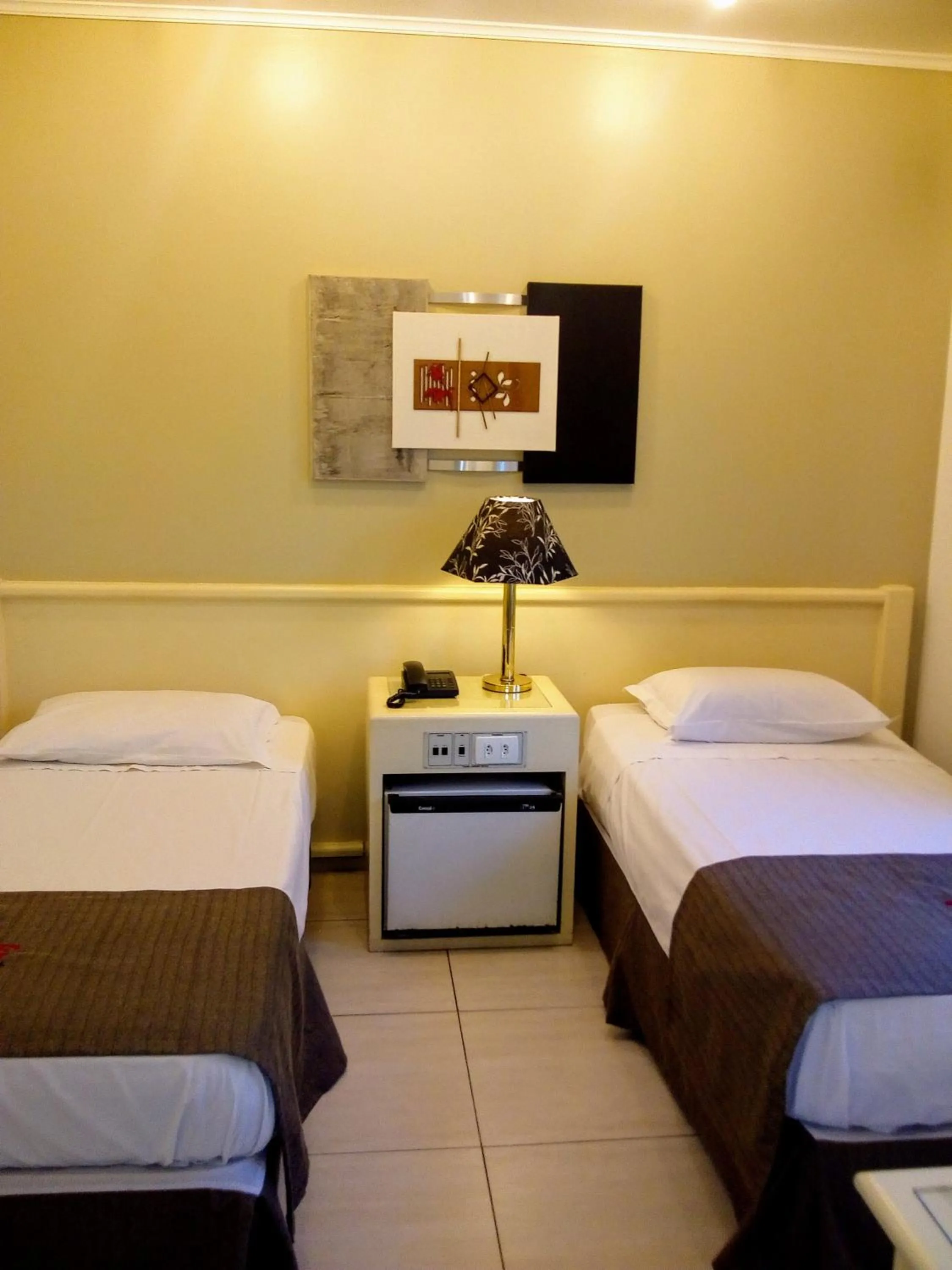 Bed in Trade Garden Hotel