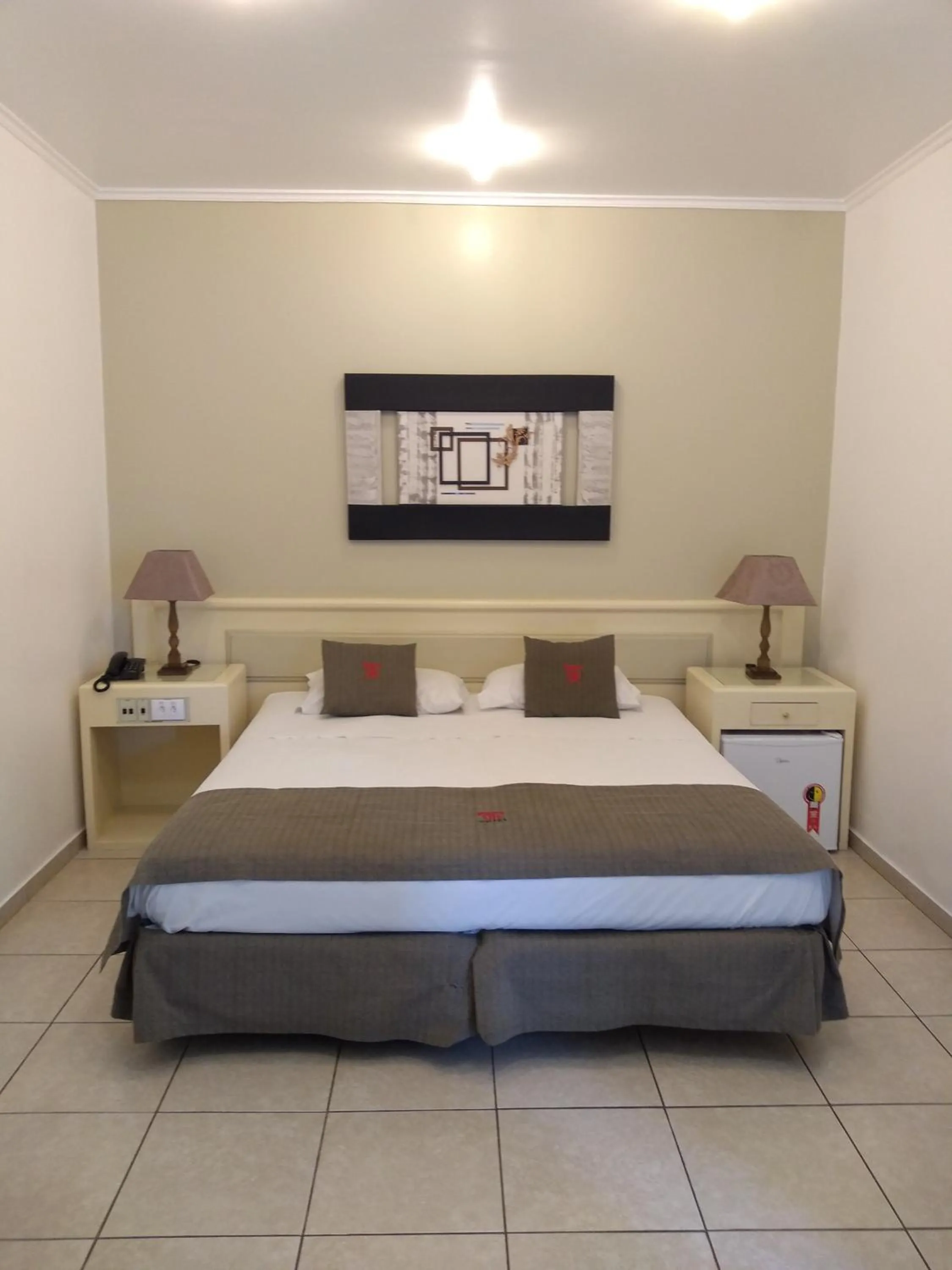 Bed in Trade Garden Hotel