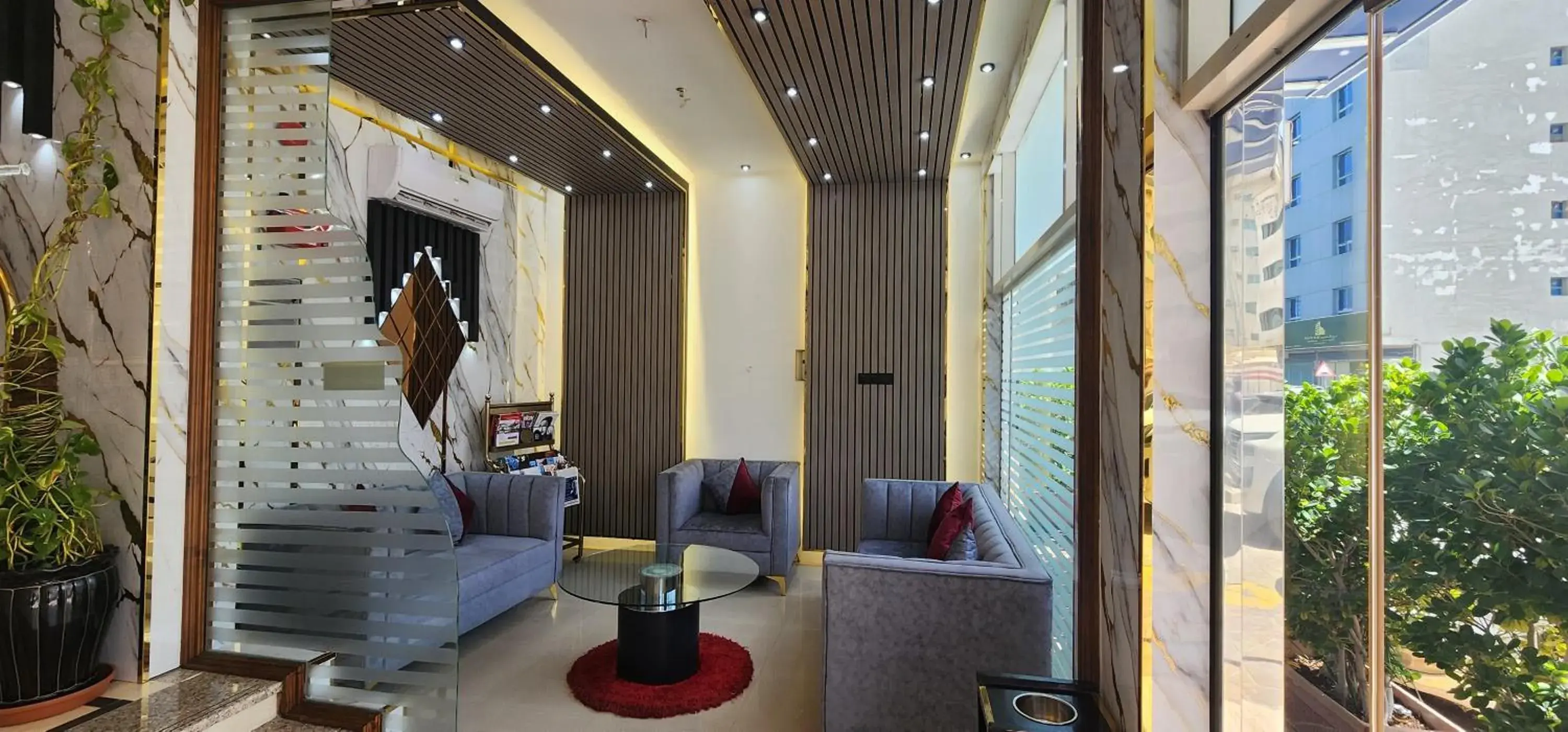 Property building in Al Smou Hotel Apartments - MAHA HOSPITALITY GROUP Property building in Al Smou Hotel Apartments - MAHA HOSPITALITY GROUP