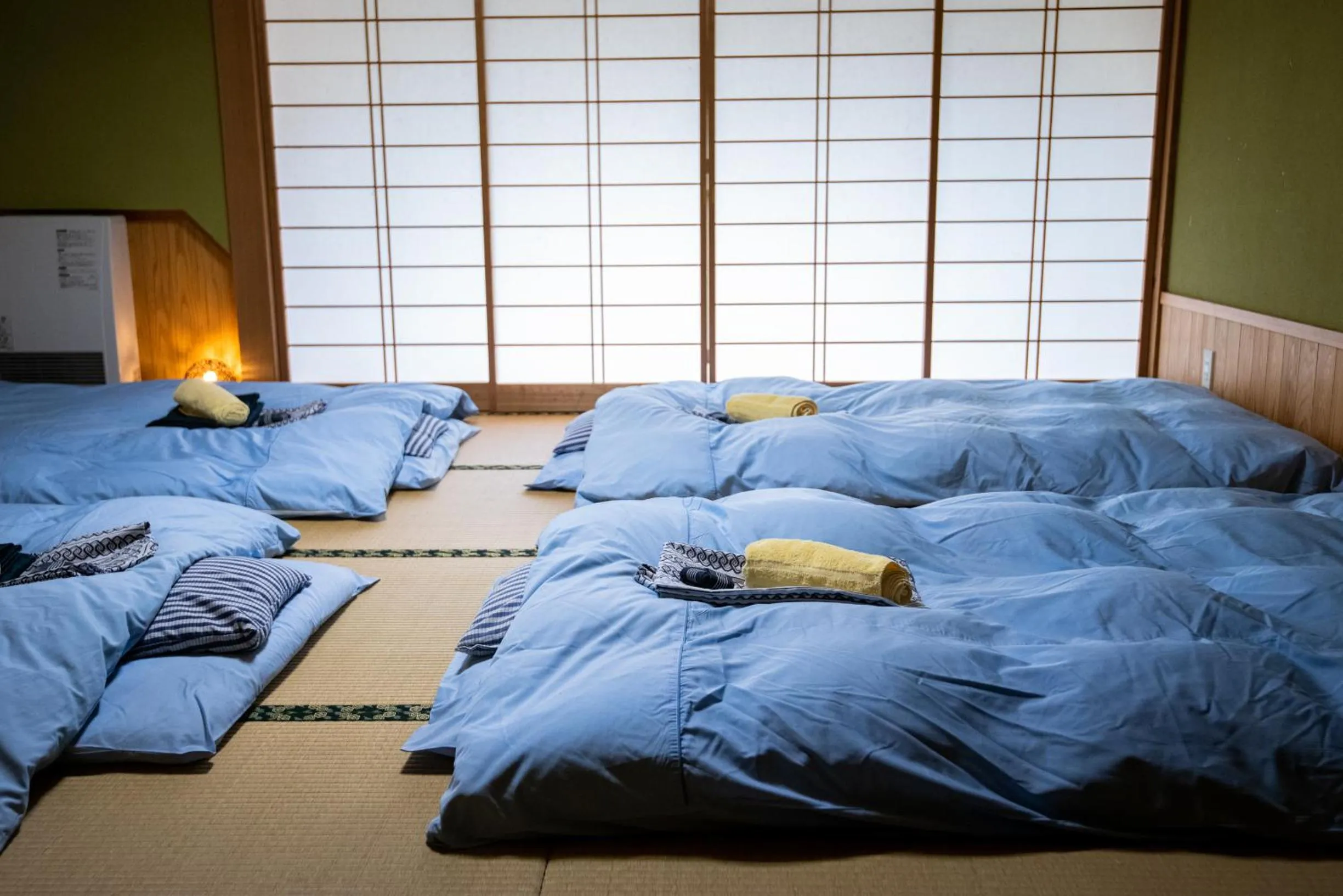 Bed in Toemu Nozawa Lodge