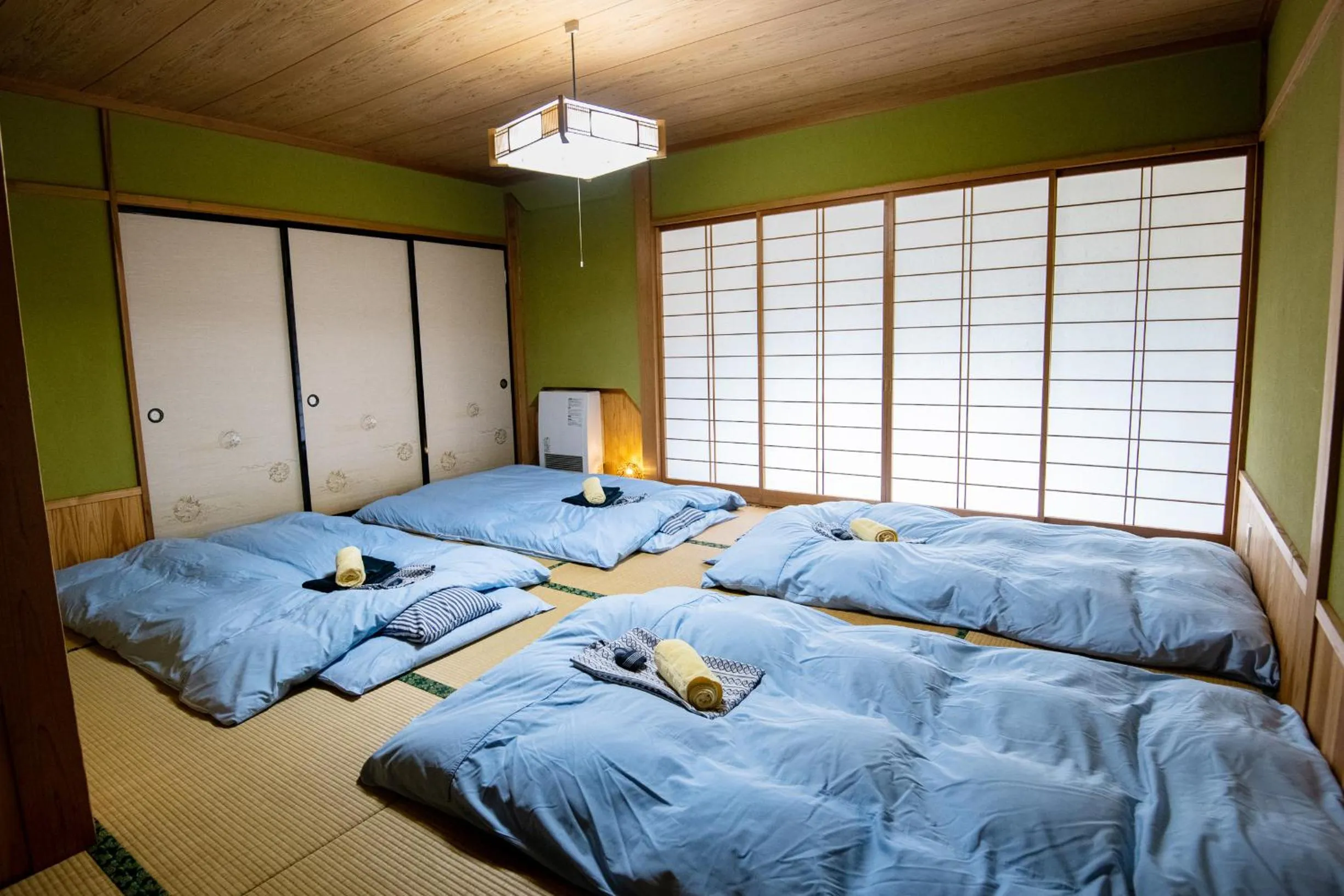 Bed in Toemu Nozawa Lodge