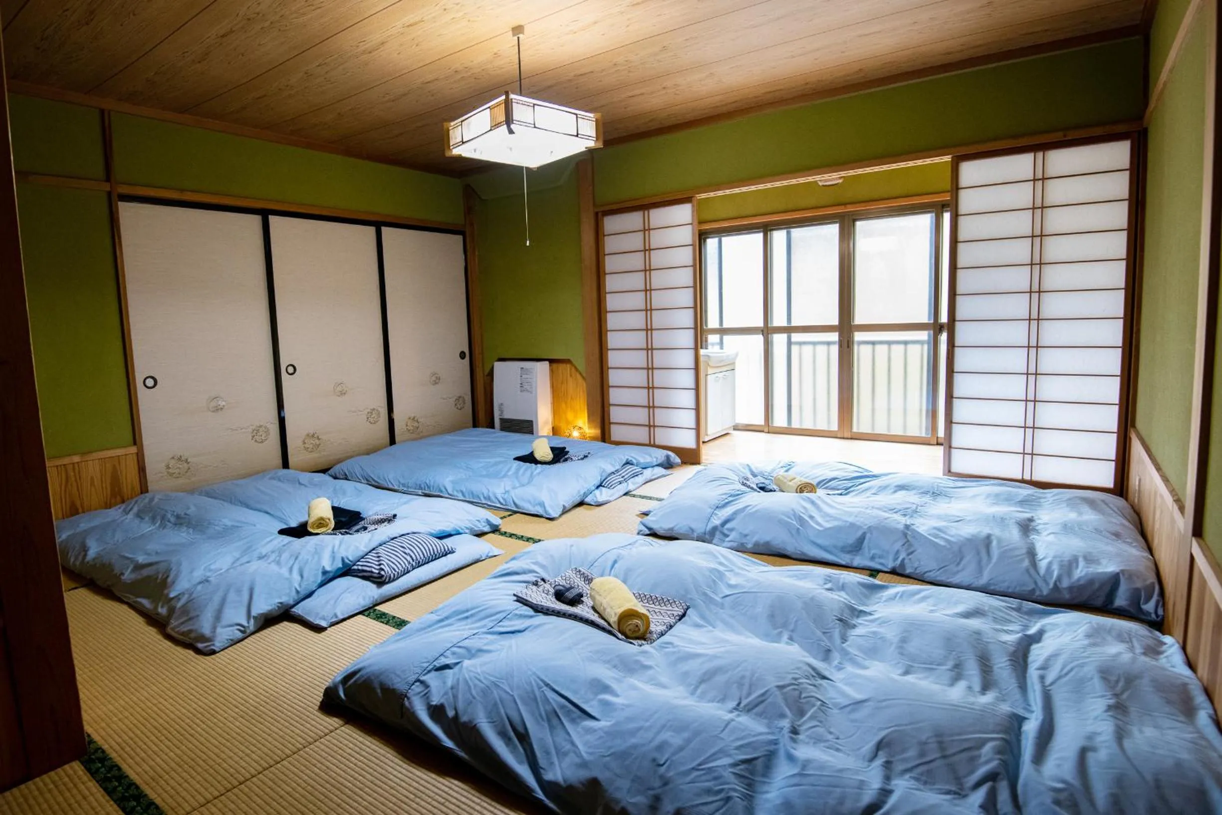 Bed in Toemu Nozawa Lodge