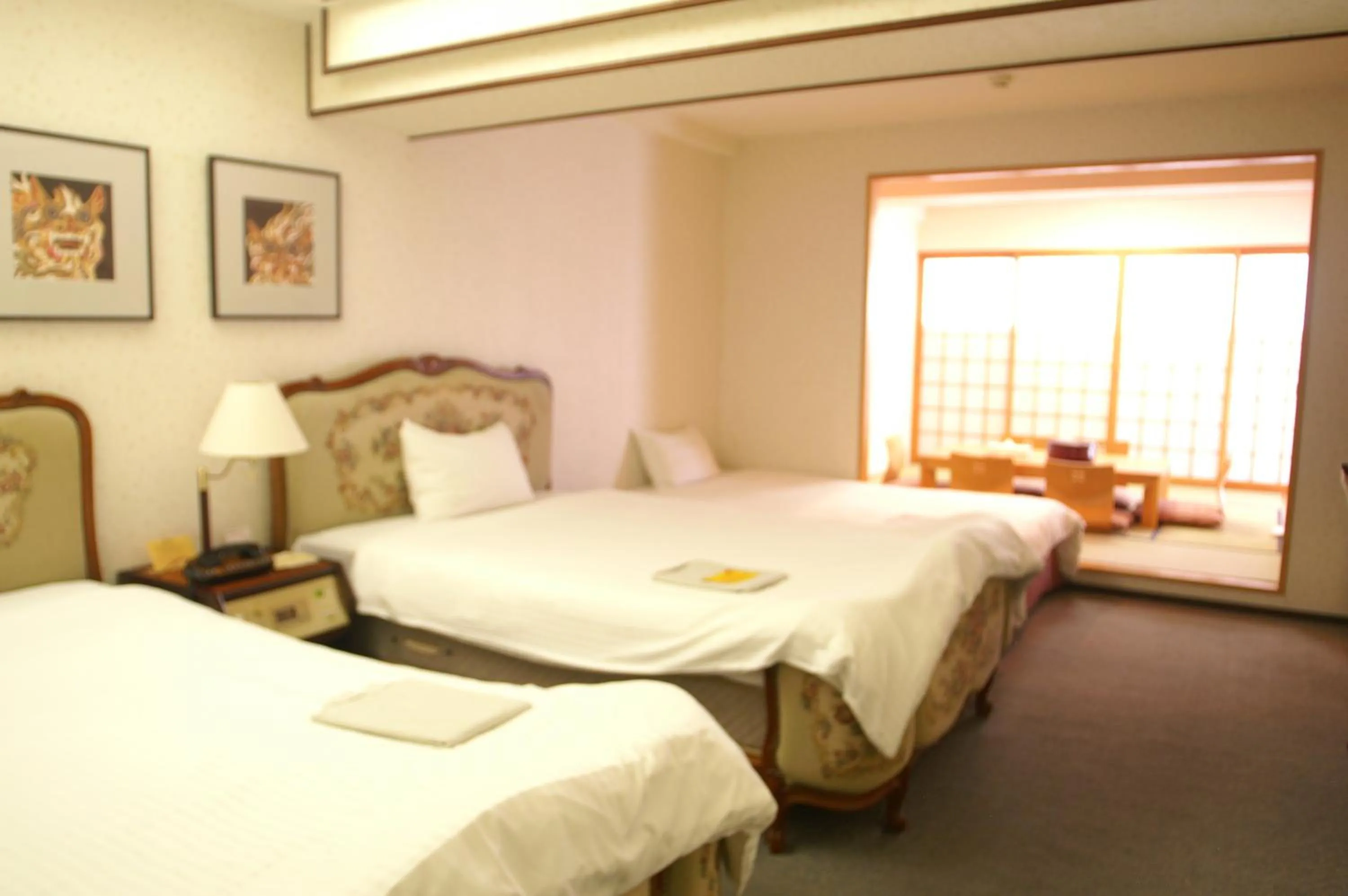 Photo of the whole room, Bed in Ryukyu Sun Royal Hotel
