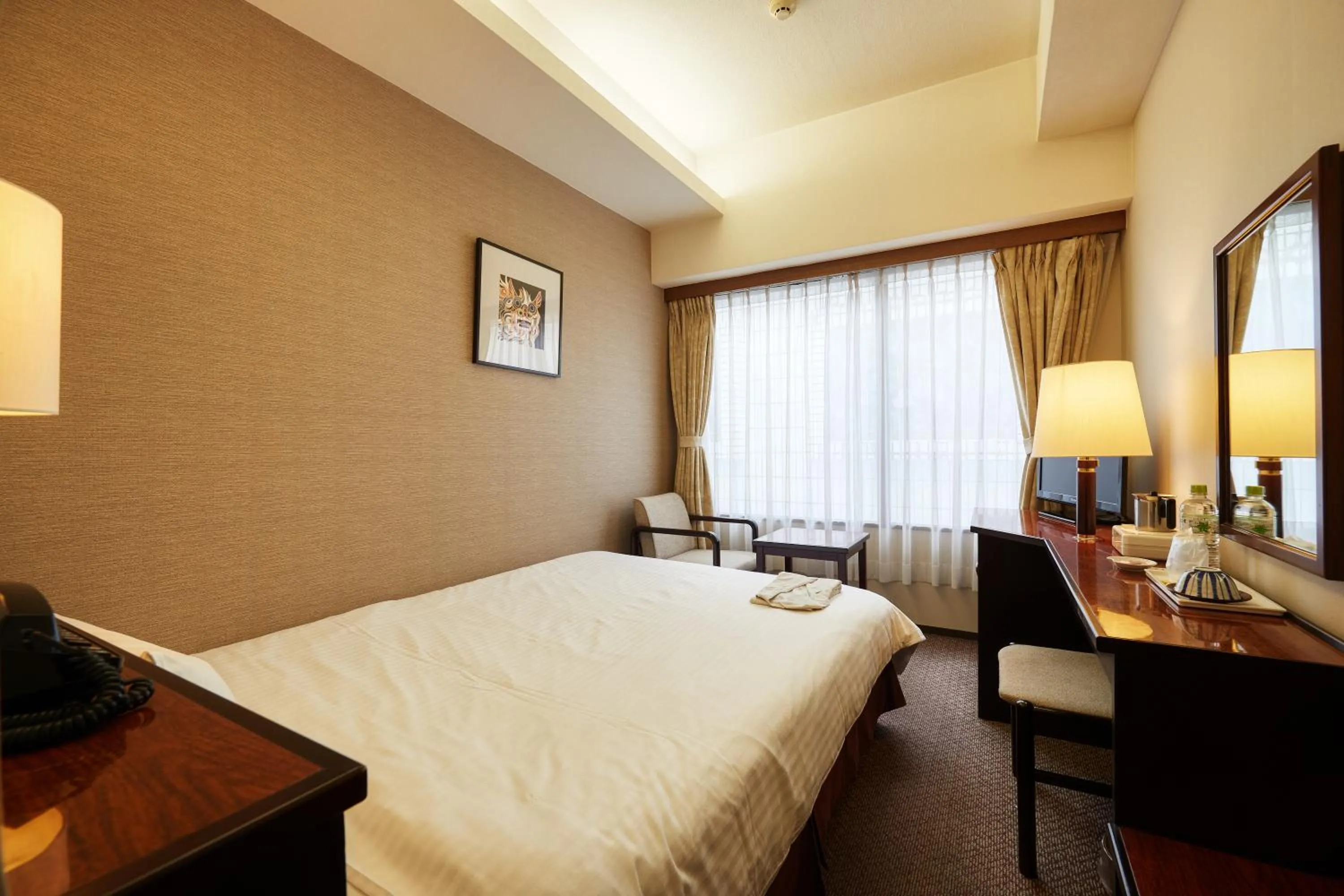 Bed in Ryukyu Sun Royal Hotel