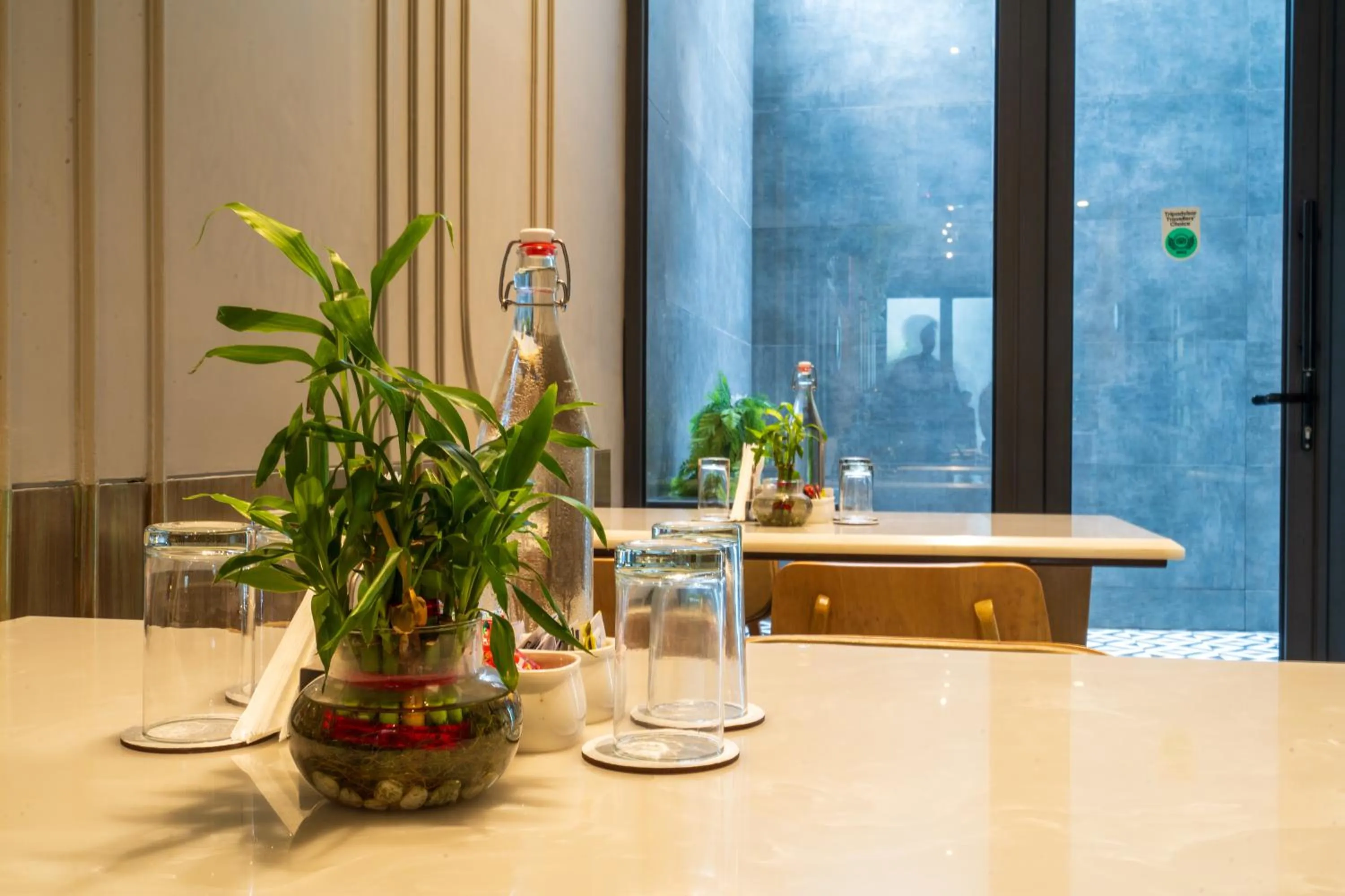 Dining area in Cosy Grand, Chanakyapuri by The Cosy Hotels