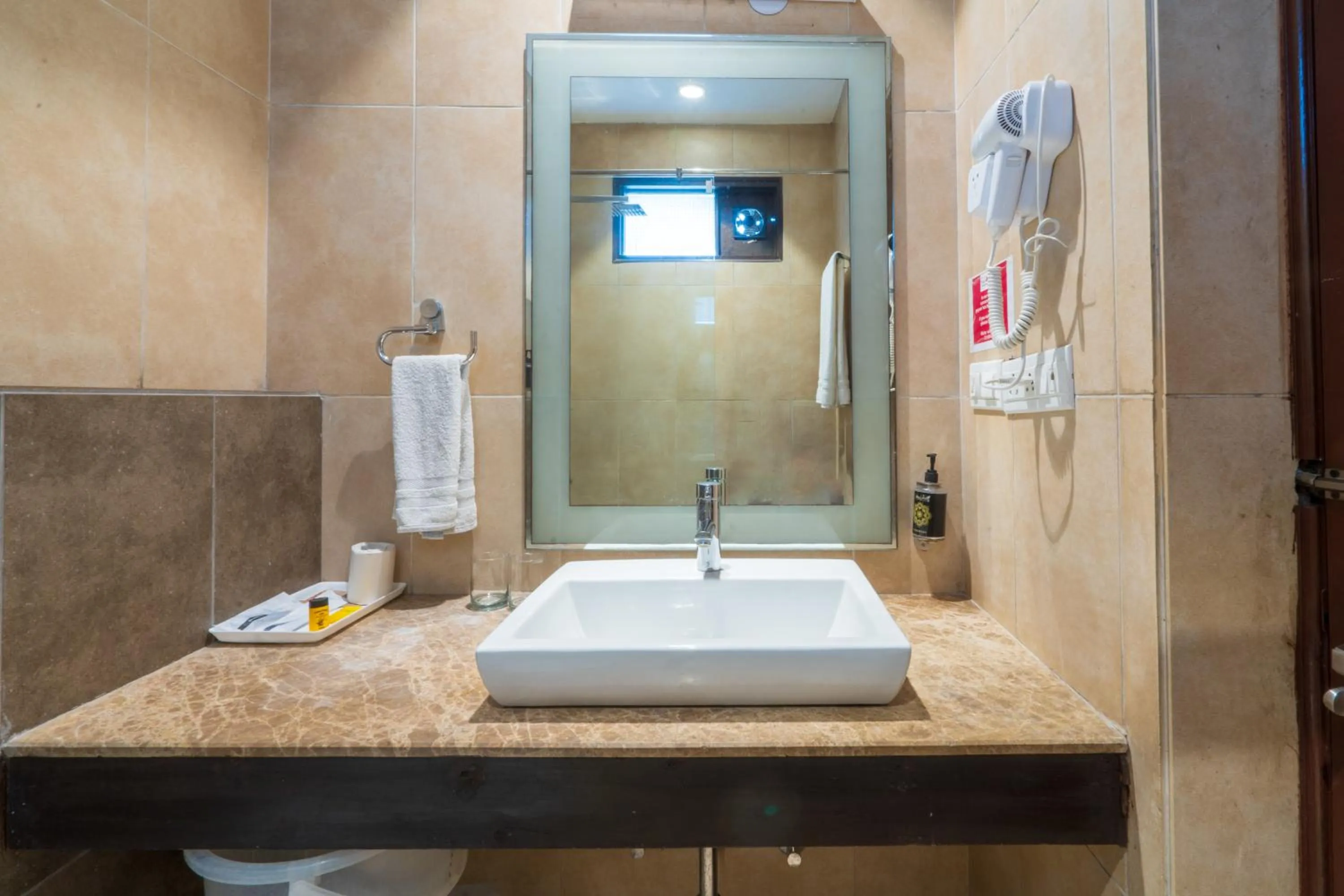 Bathroom in Cosy Grand, Chanakyapuri by The Cosy Hotels