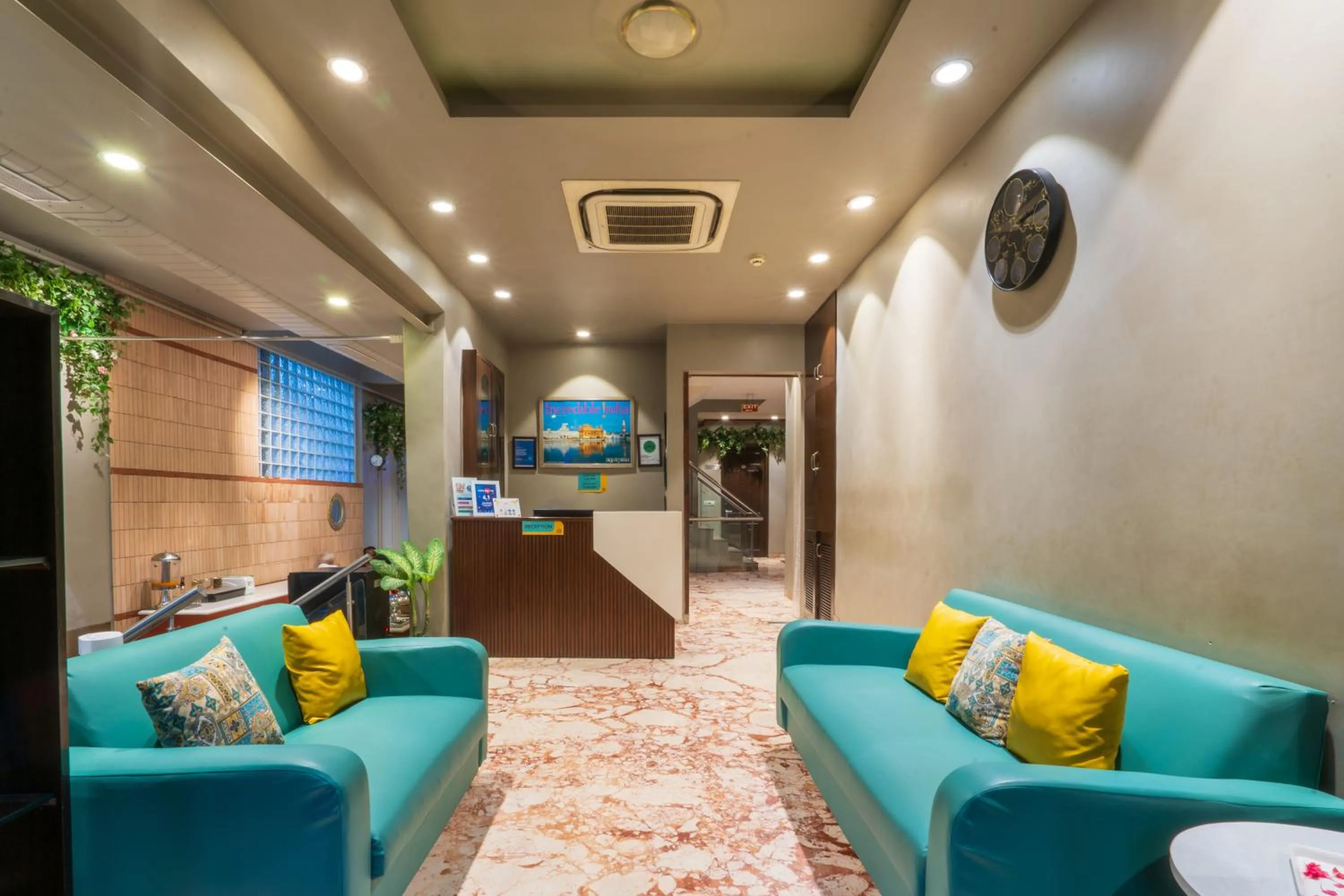 Lobby or reception in Cosy Grand, Chanakyapuri by The Cosy Hotels