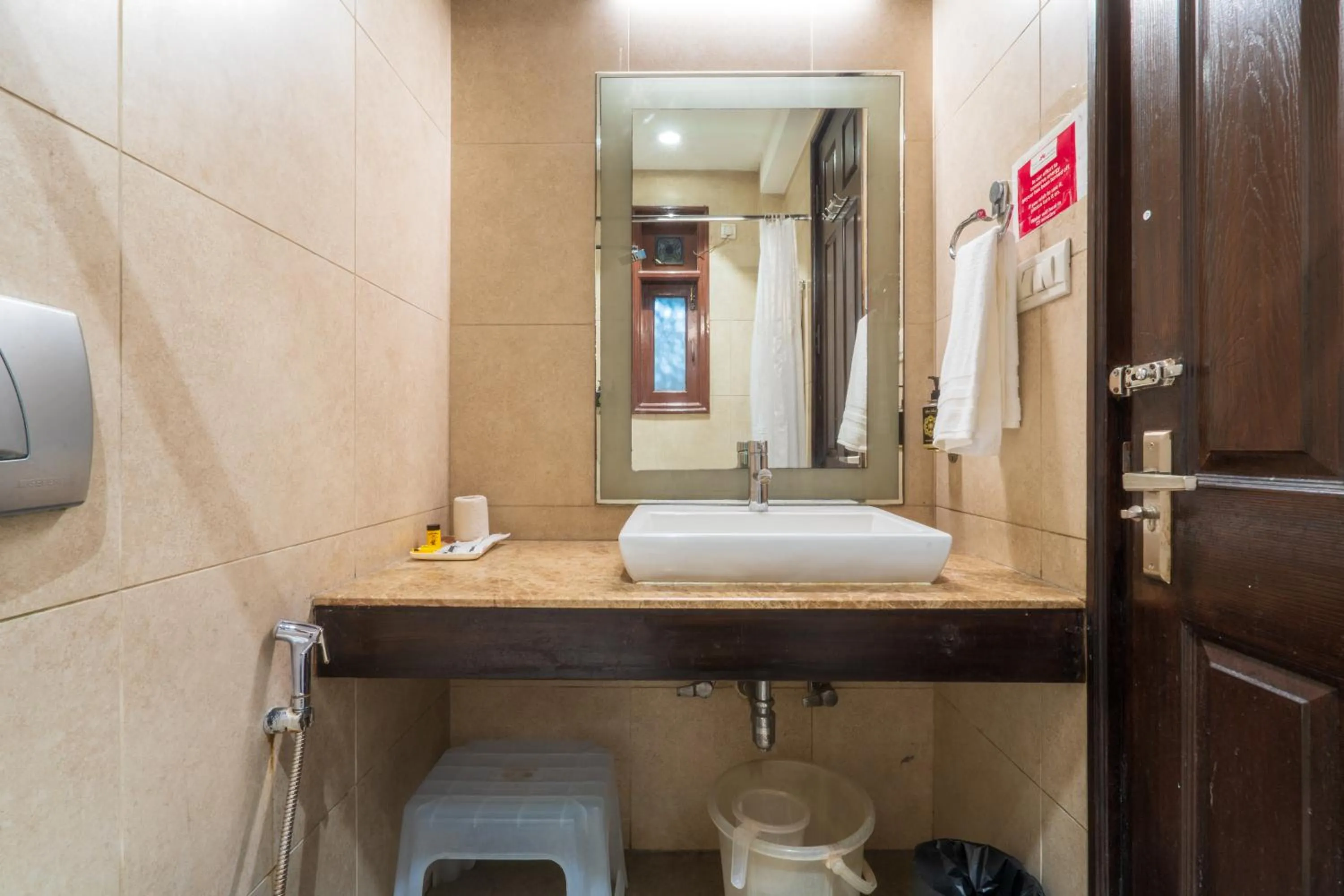 Bathroom in Cosy Grand, Chanakyapuri by The Cosy Hotels