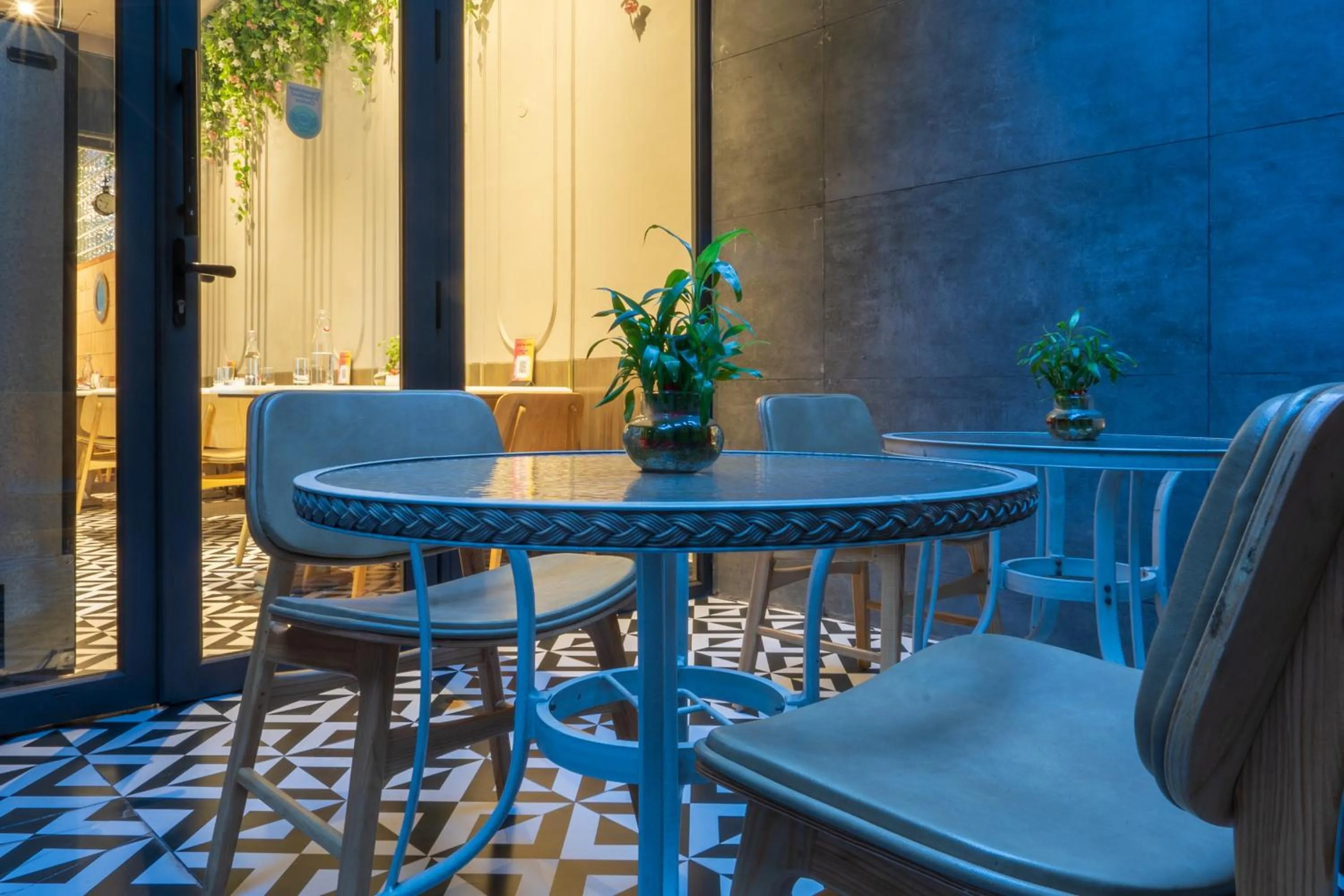 Seating area in Cosy Grand, Chanakyapuri by The Cosy Hotels