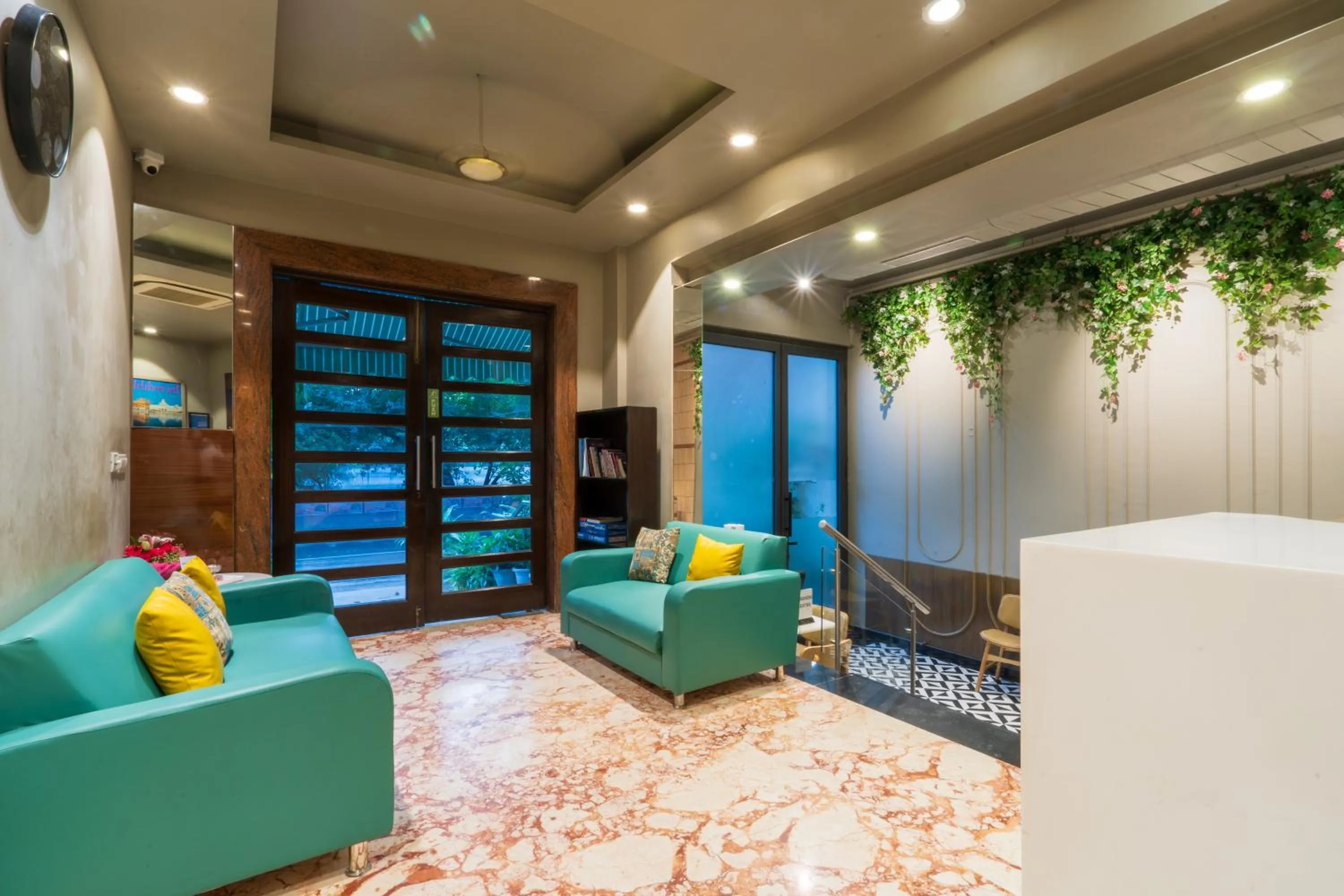 Lobby or reception in Cosy Grand, Chanakyapuri by The Cosy Hotels