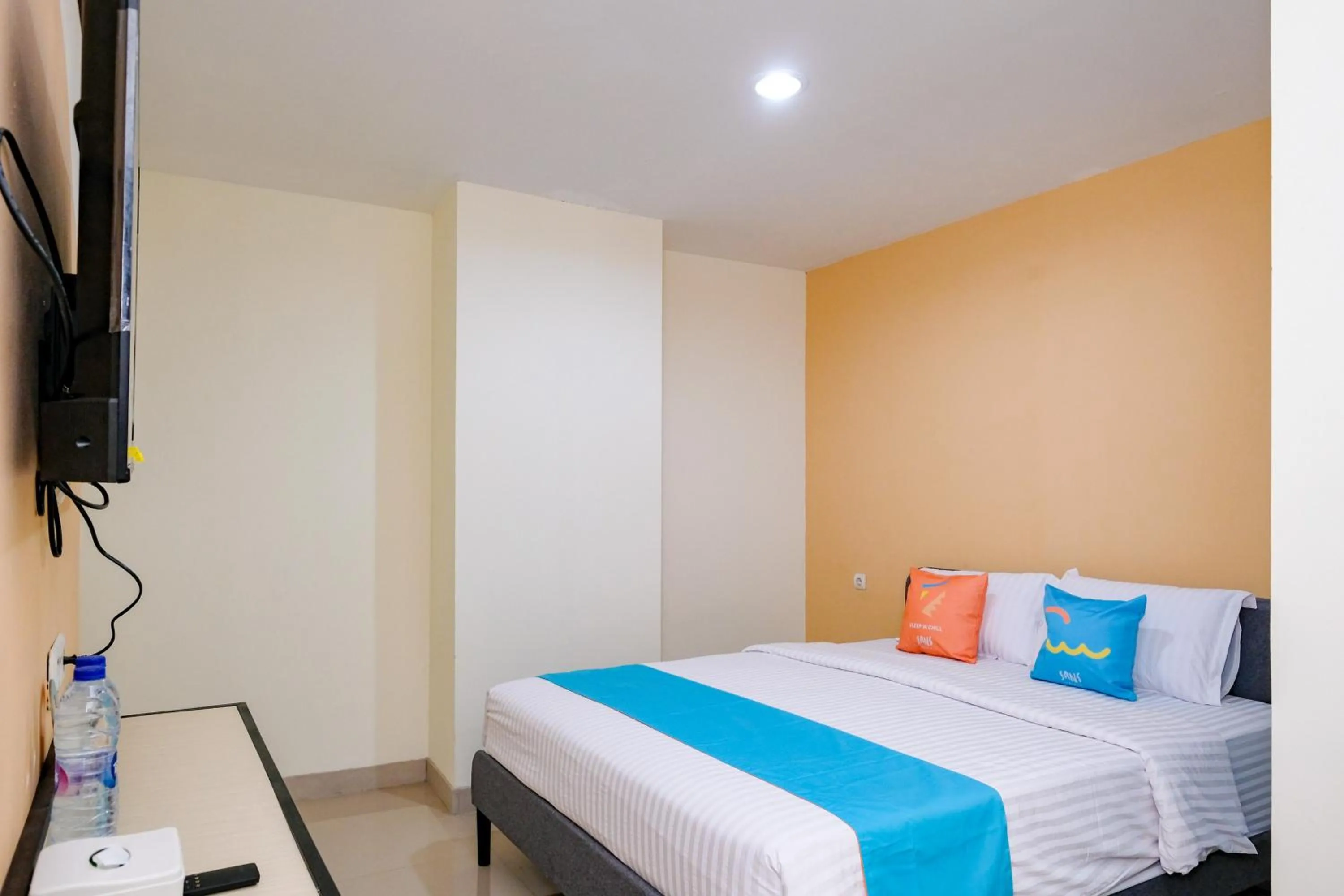 Bedroom, Bed in Sans Hotel Mataram Malioboro