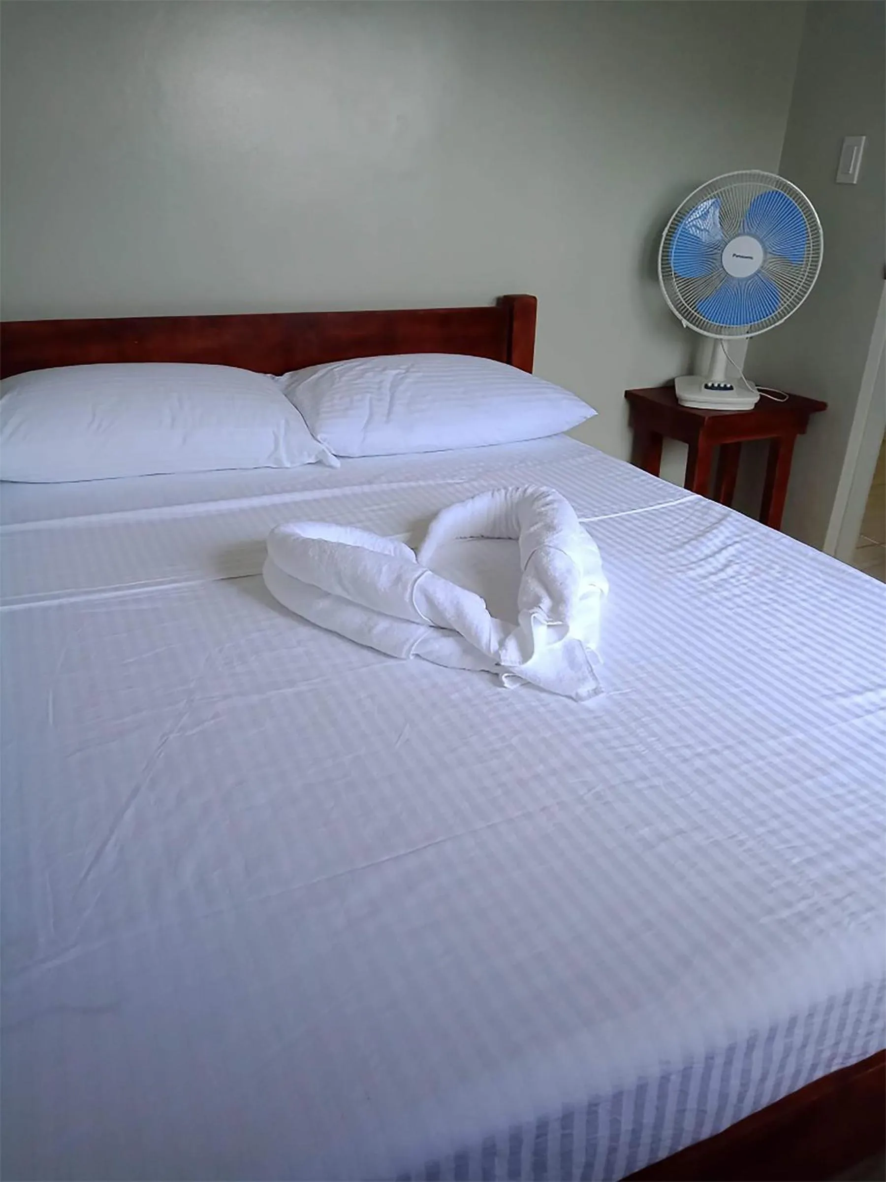 Bed in Sunrise Beach Club Resort Amanecer