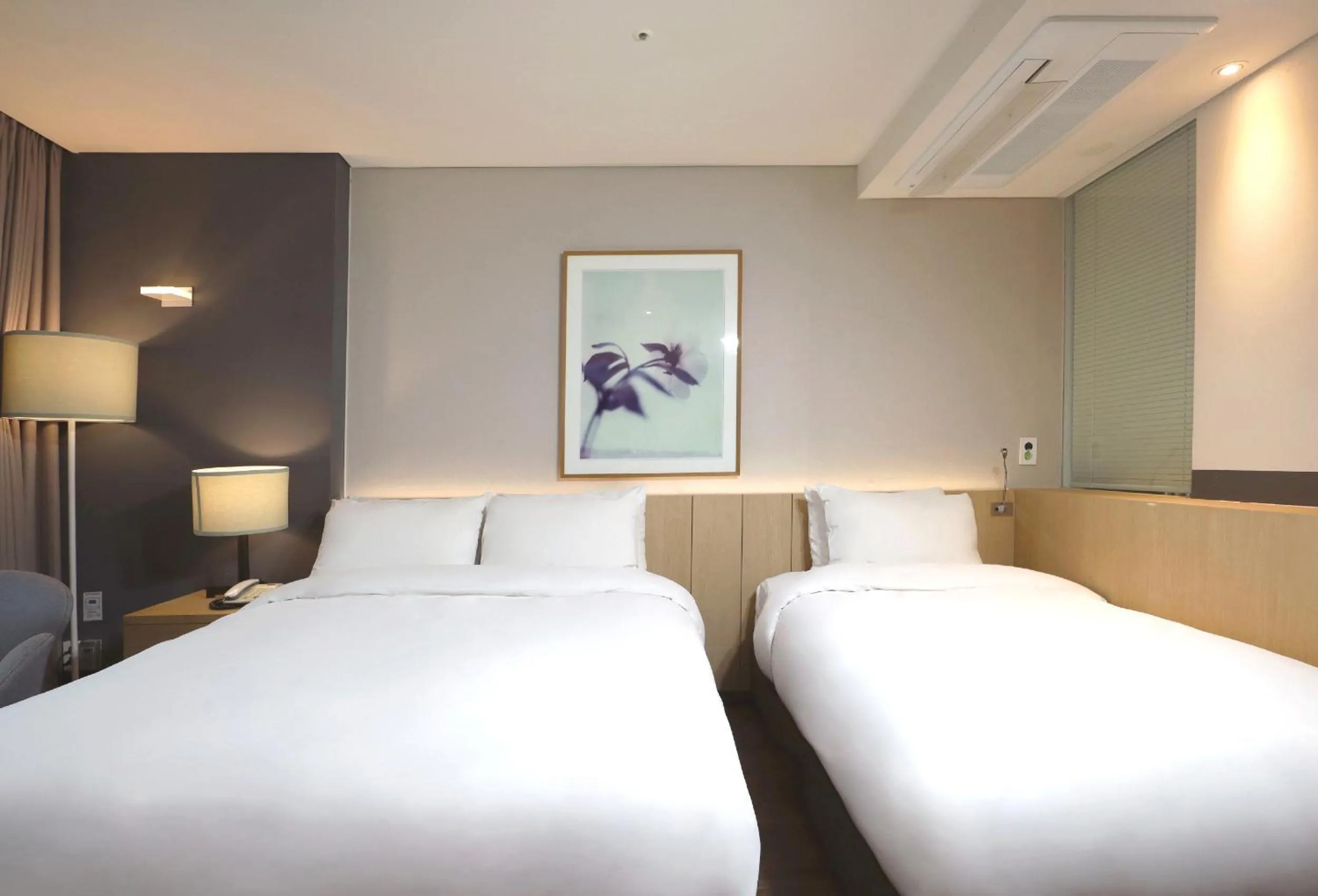 Bed in Eden Paradise Hotel