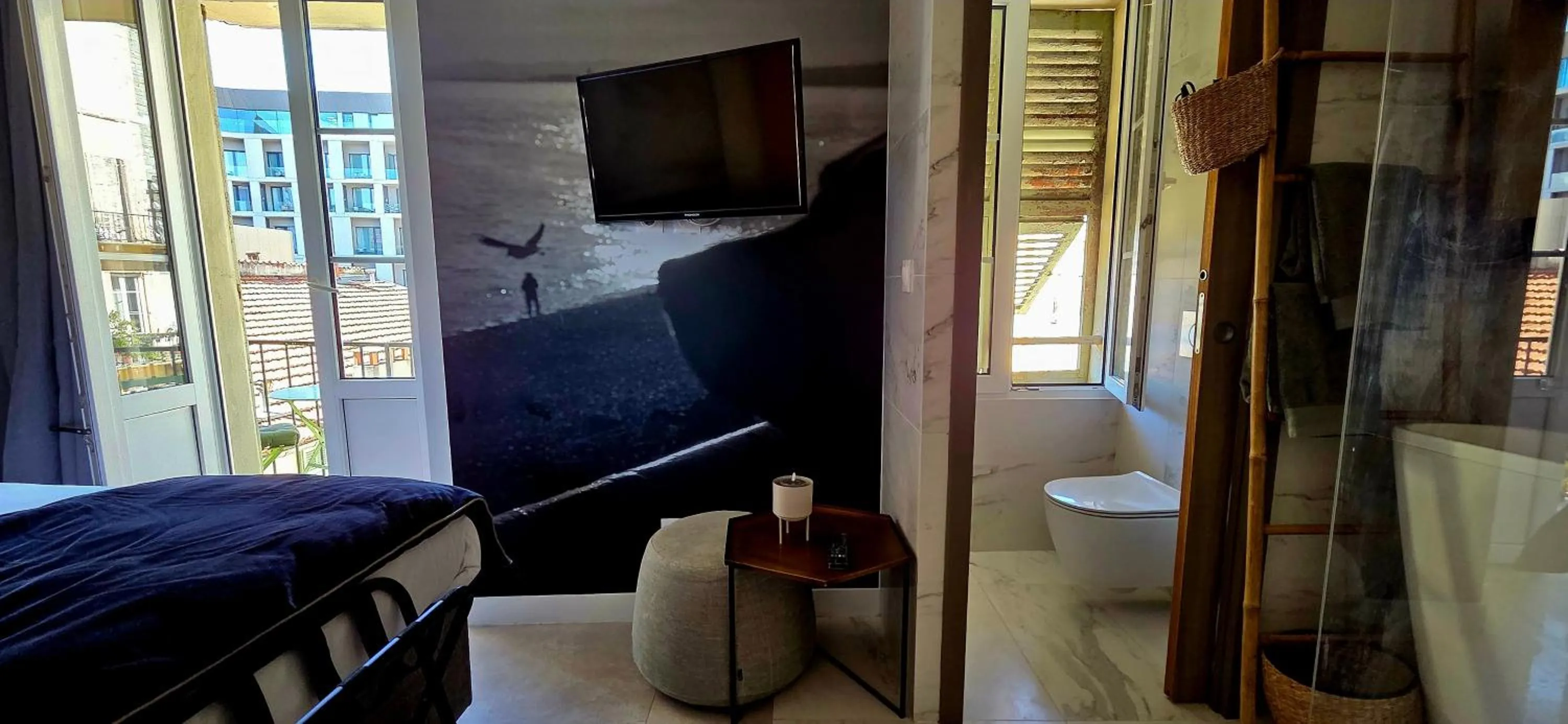 Bed in Le Petit Trianon et le Charme des Suites