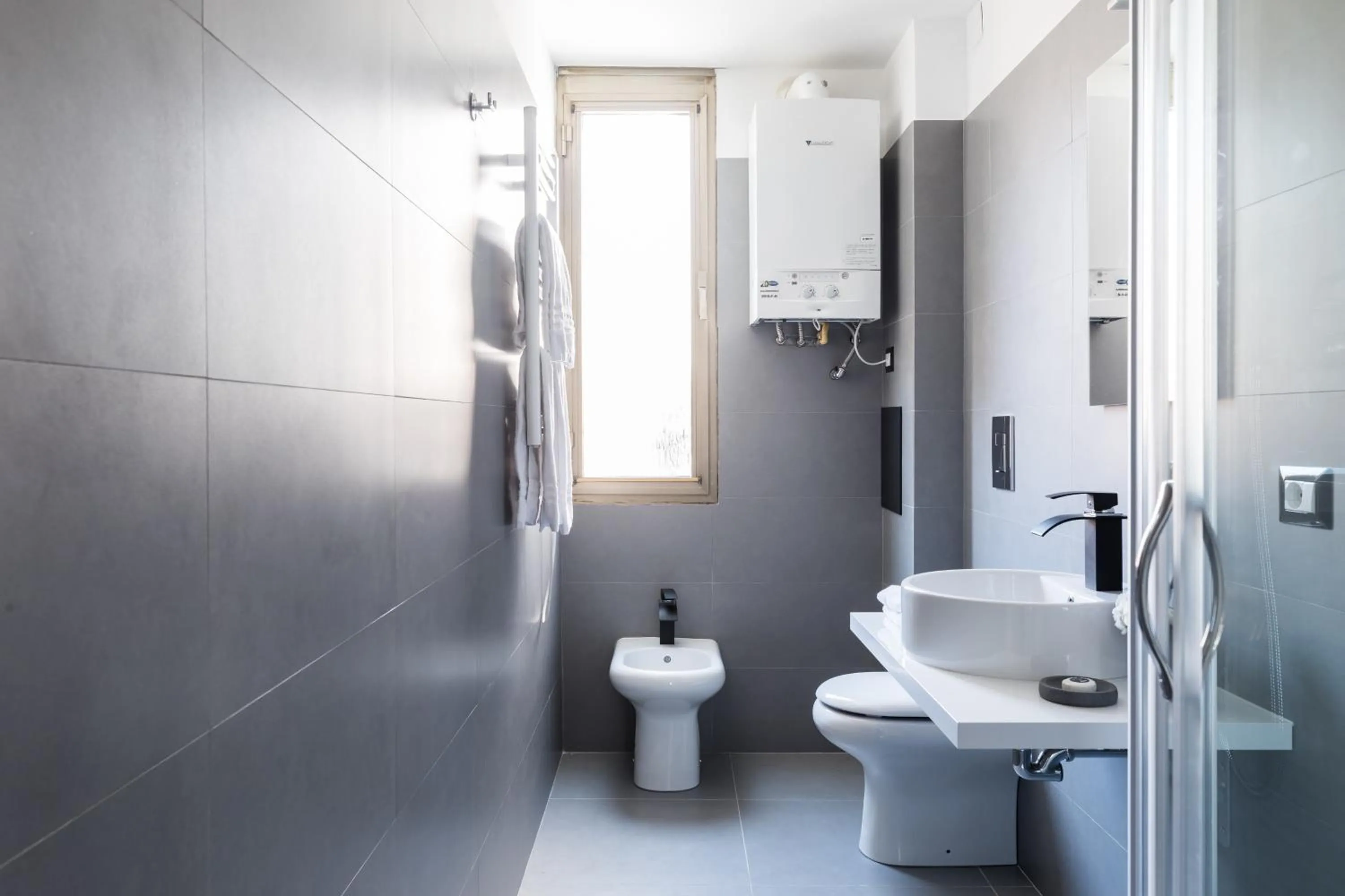 Shower in A World Aparts - 32 Modena