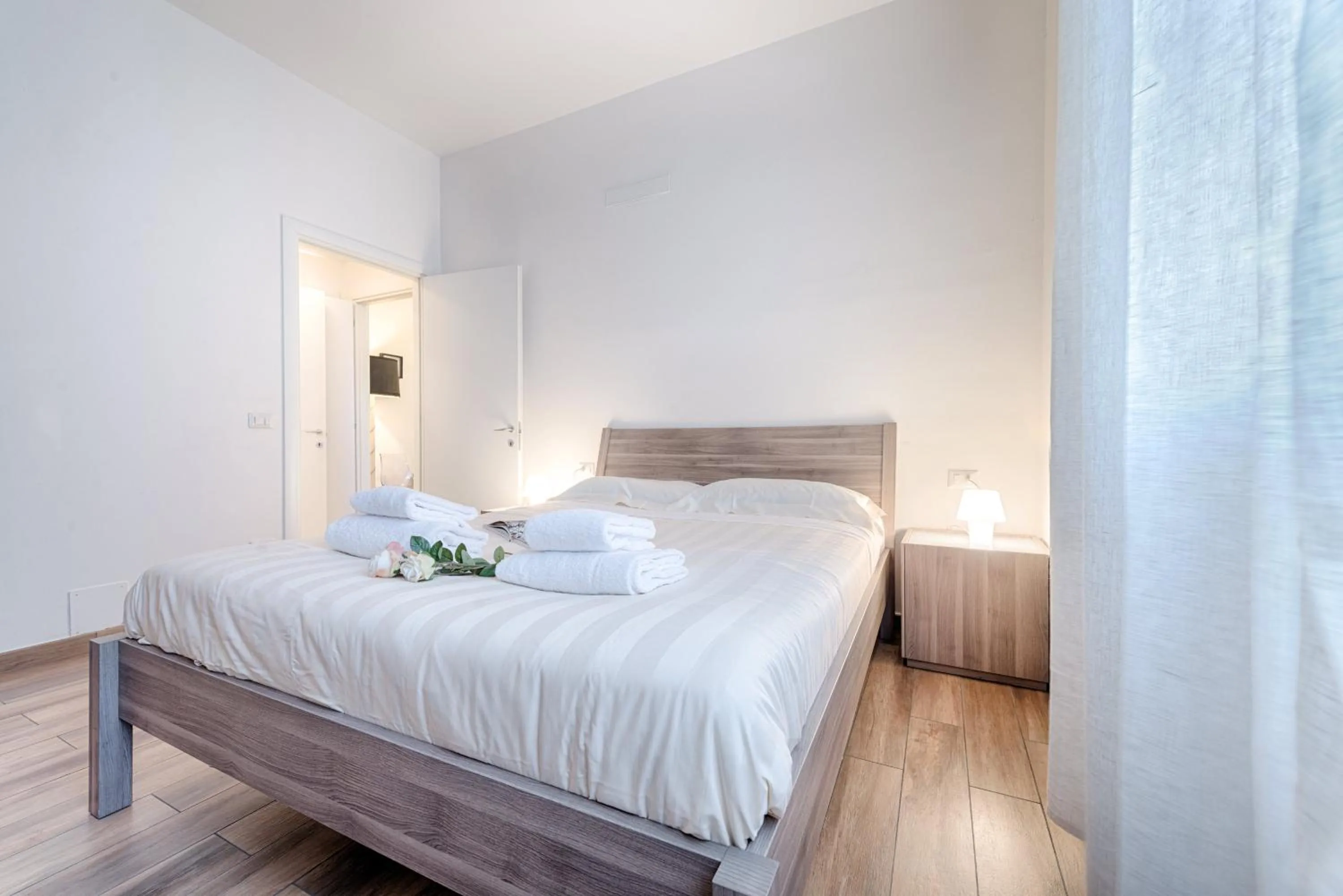 Bed in Polo Universitario apartment by Mmega
