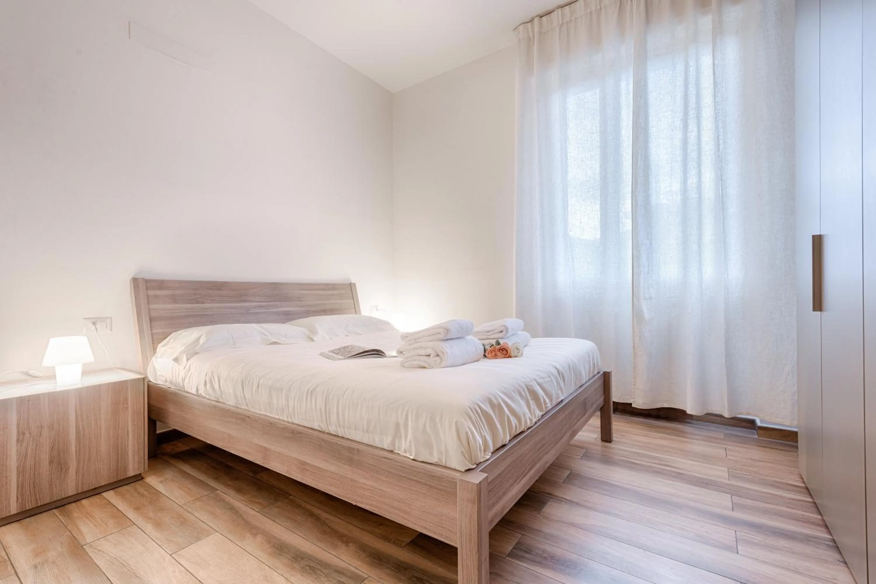 Bed in Polo Universitario apartment by Mmega