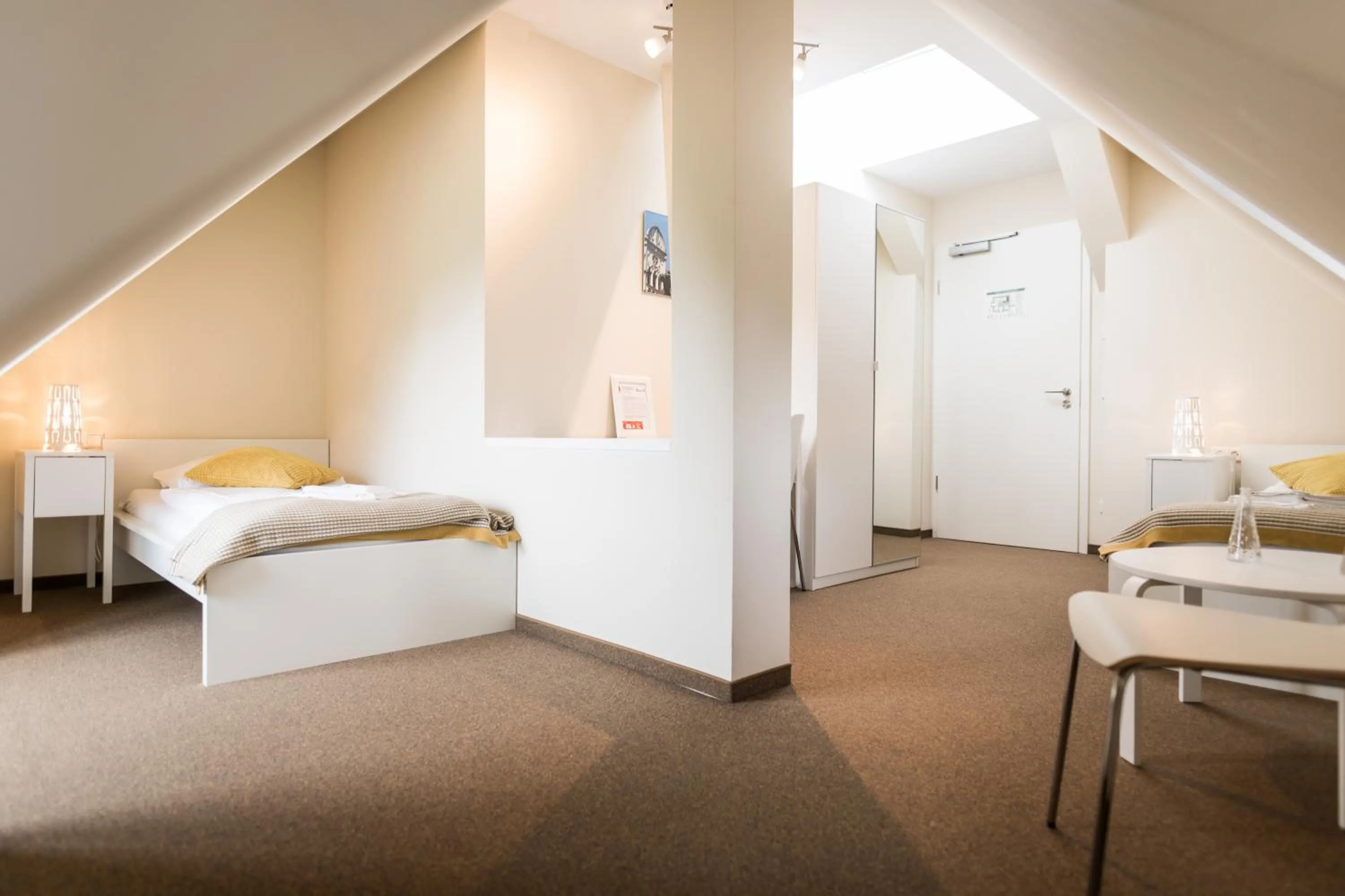 Photo of the whole room, Bed in Johanniterhaus Wittenberg