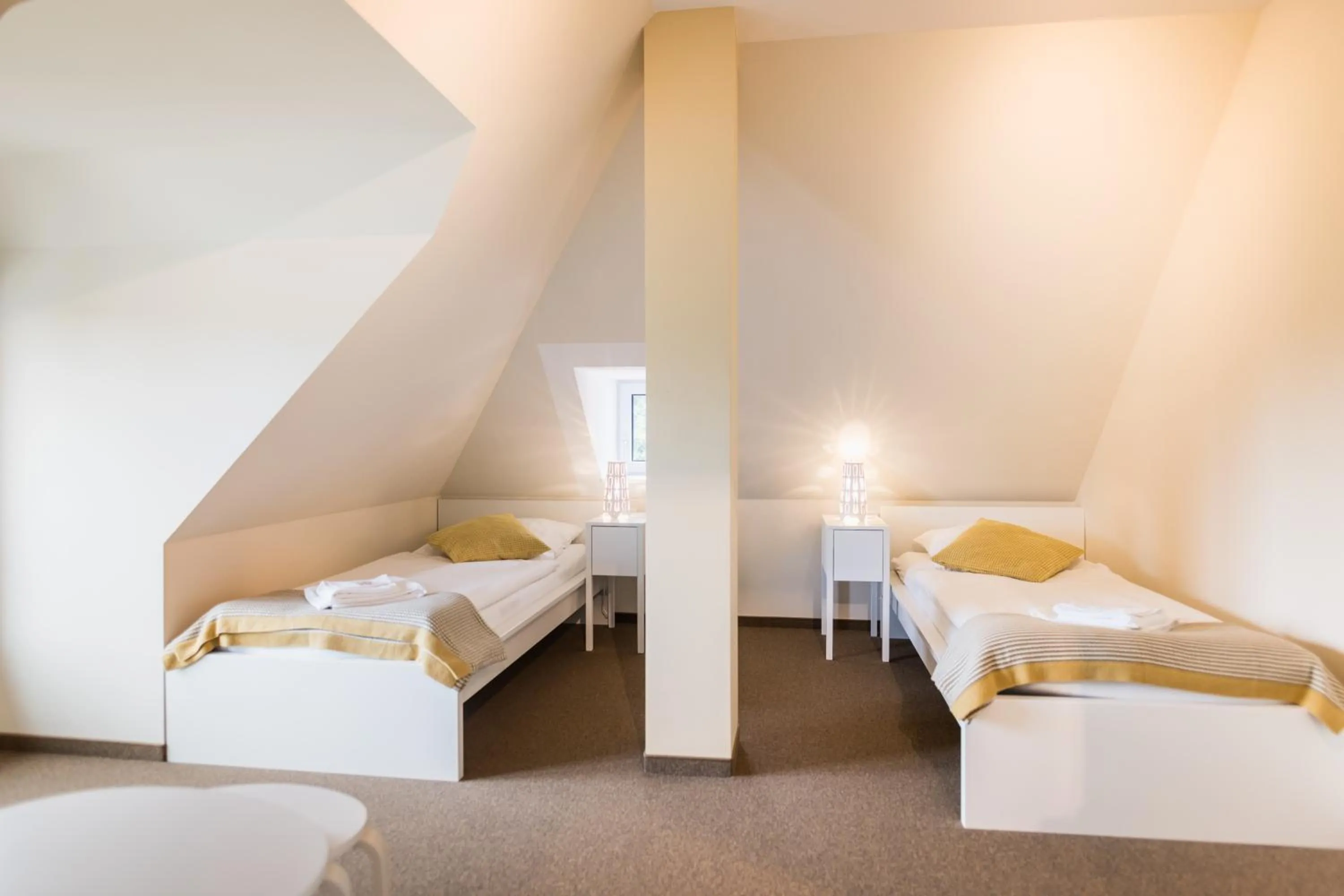 Photo of the whole room, Bed in Johanniterhaus Wittenberg