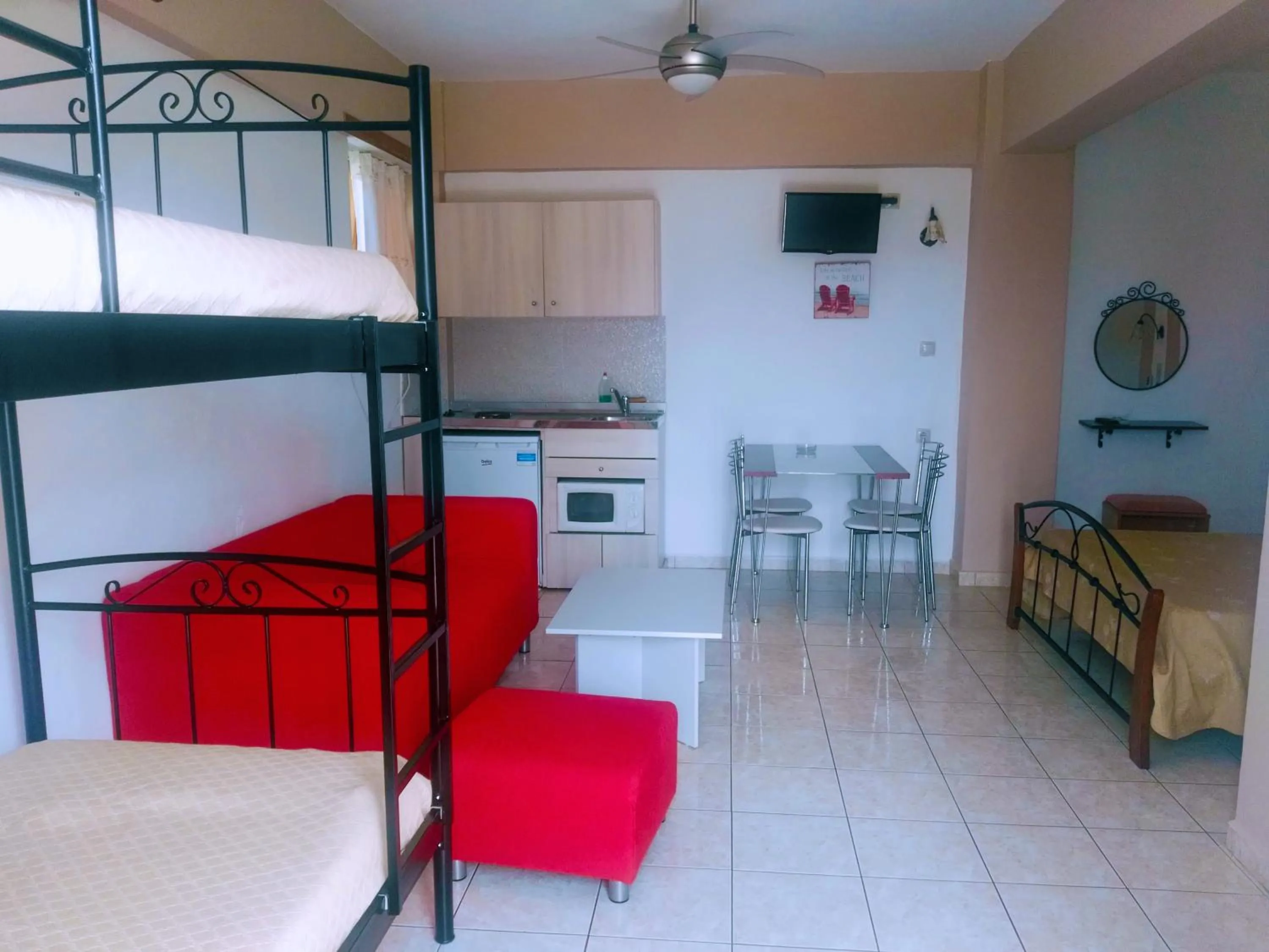 Kitchen or kitchenette, Bed in Baladinos Apartments