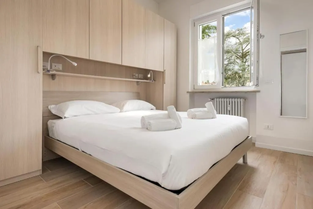 Bed in Nuova Opera Rooms & Apartments