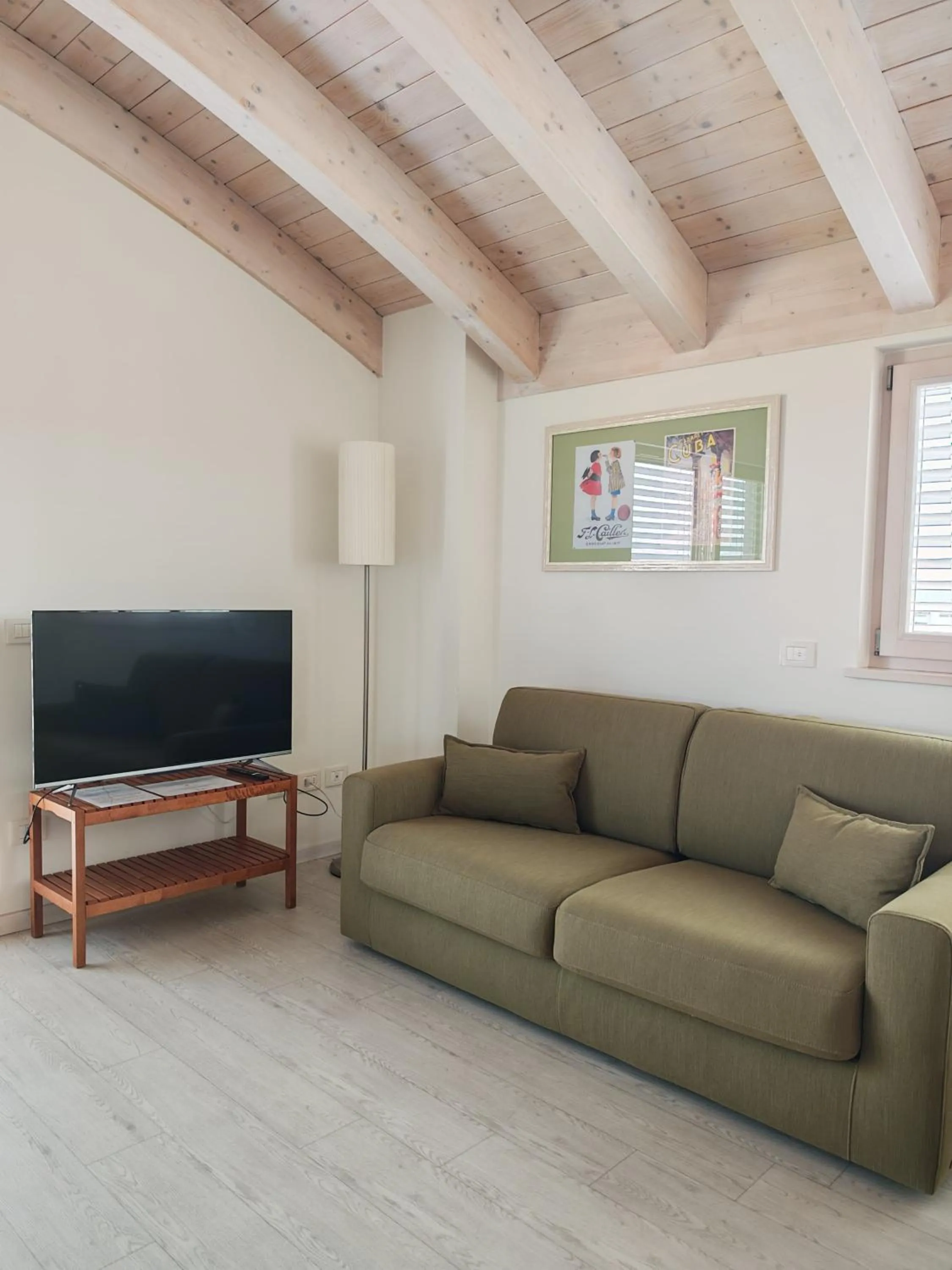 Living room in Nuova Opera Rooms & Apartment