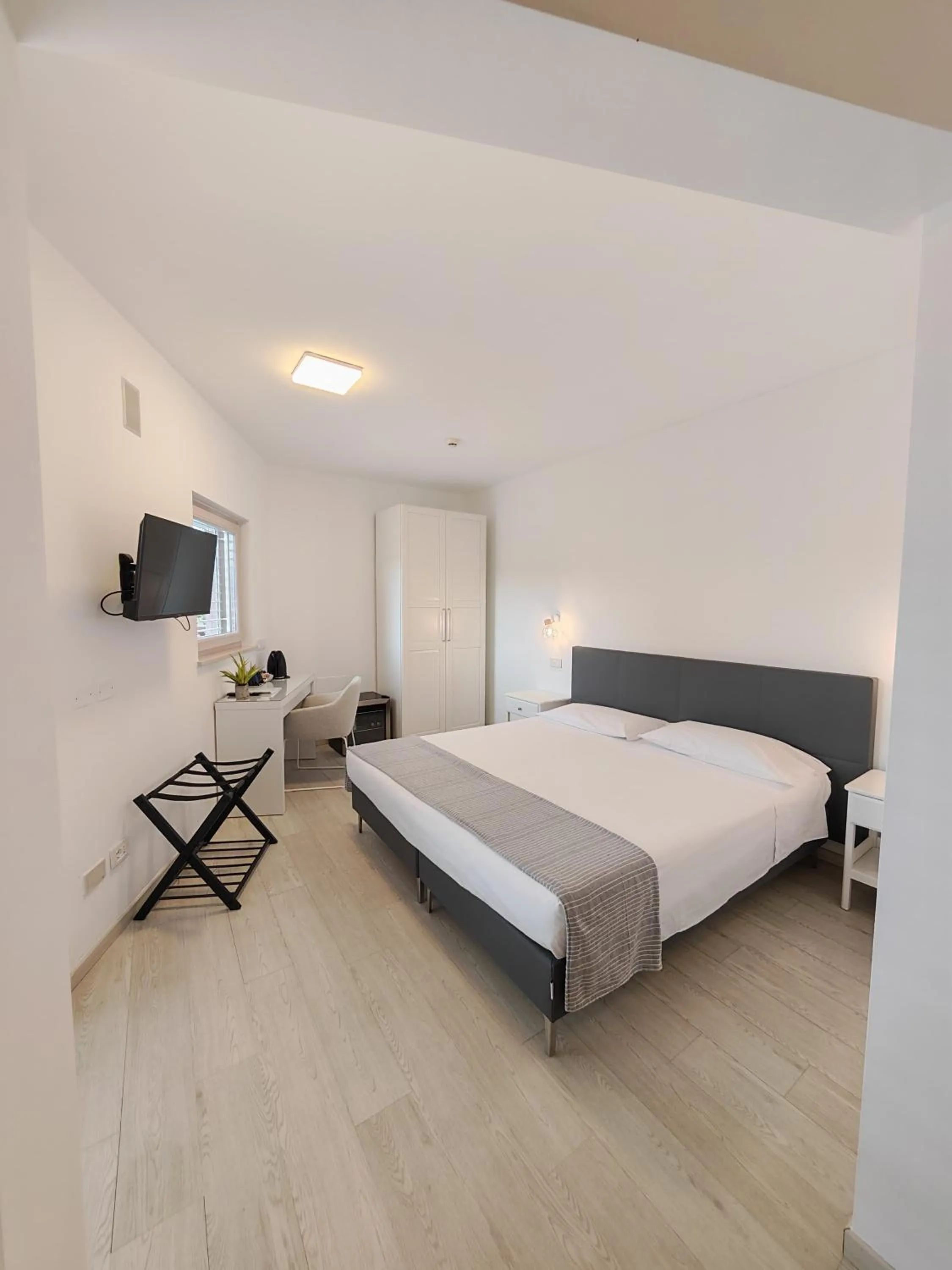 Bed in Nuova Opera Rooms & Apartment