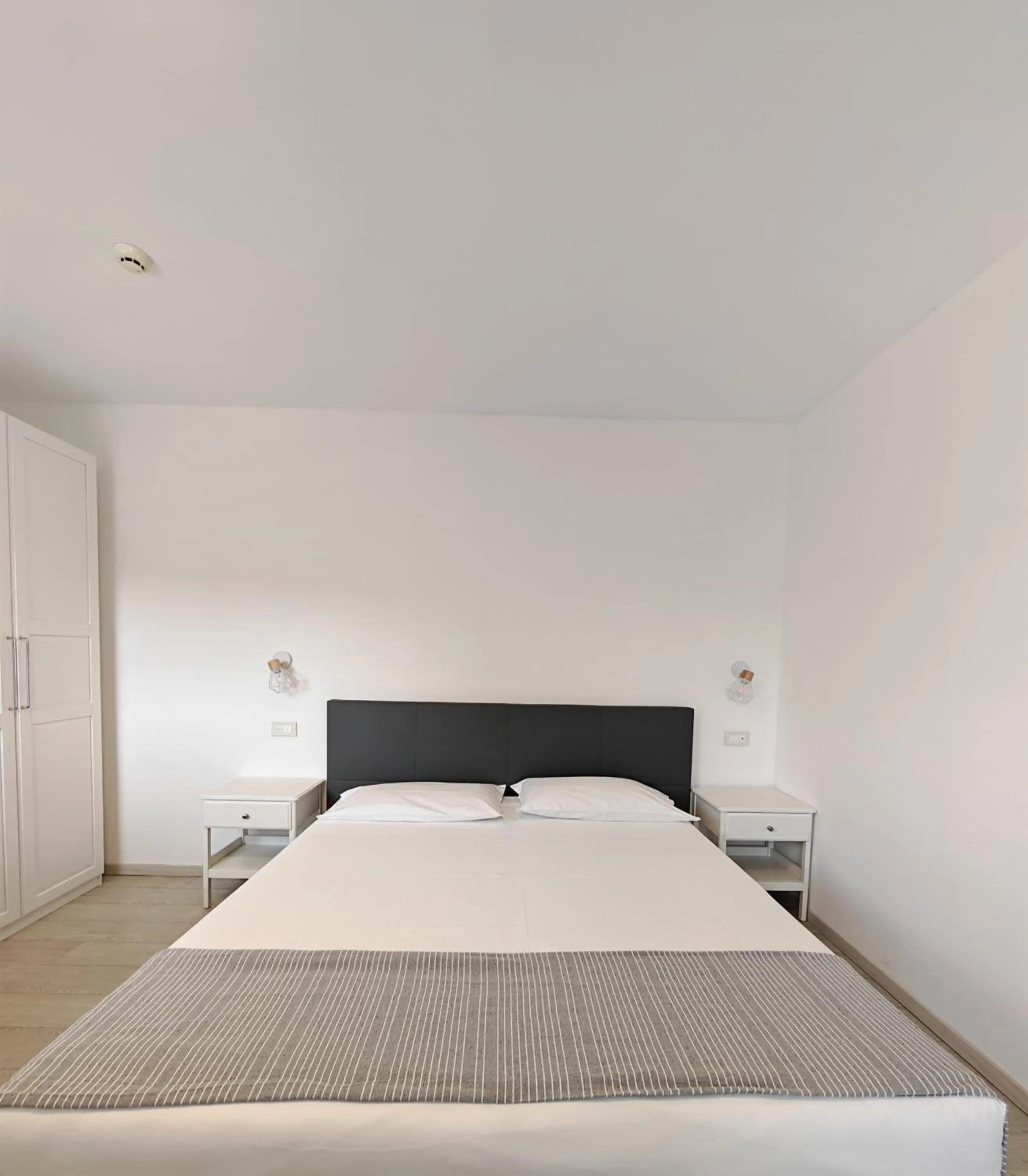 Bed in Nuova Opera Rooms & Apartment