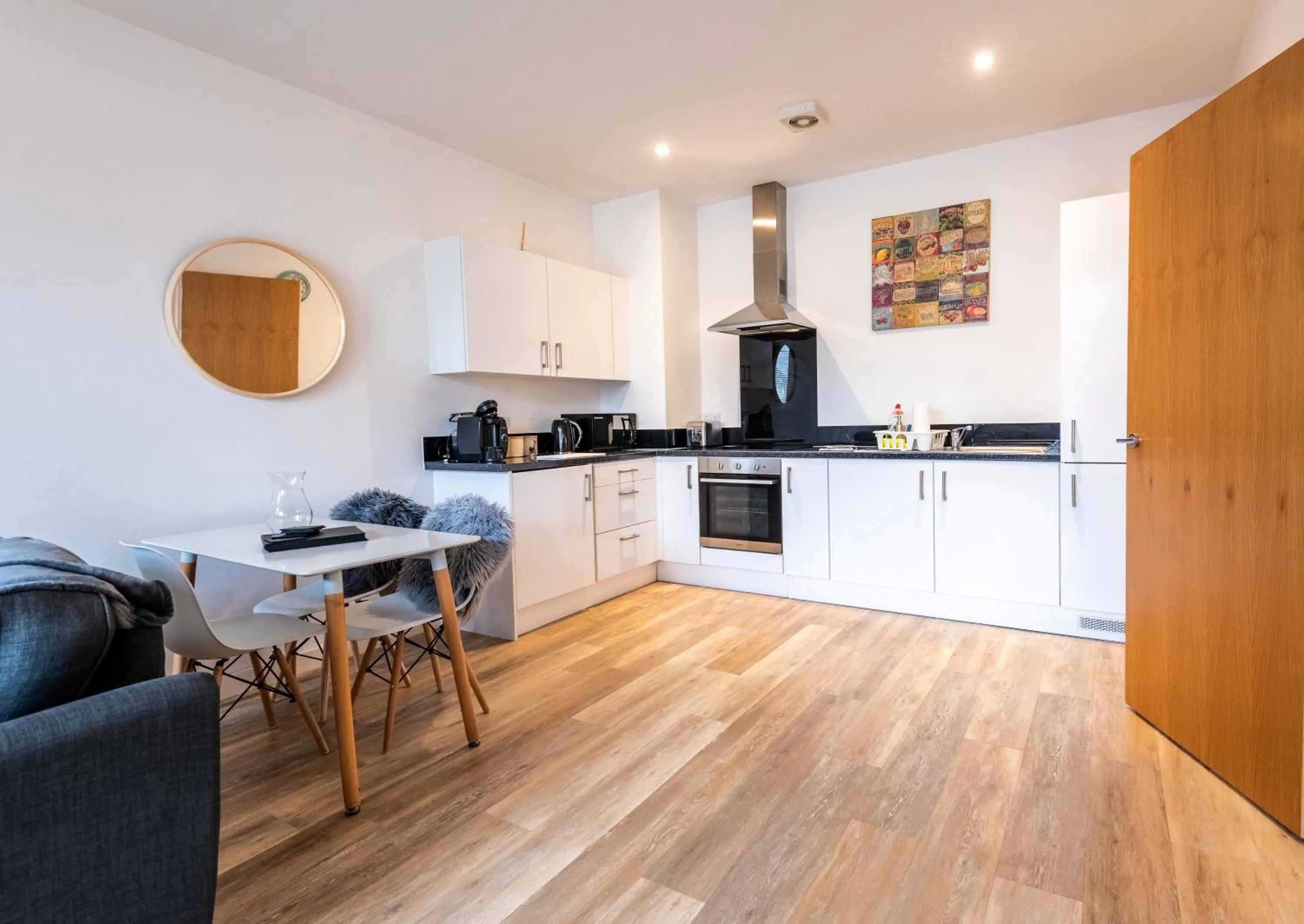 Kitchen or kitchenette in City Suites by Guestz