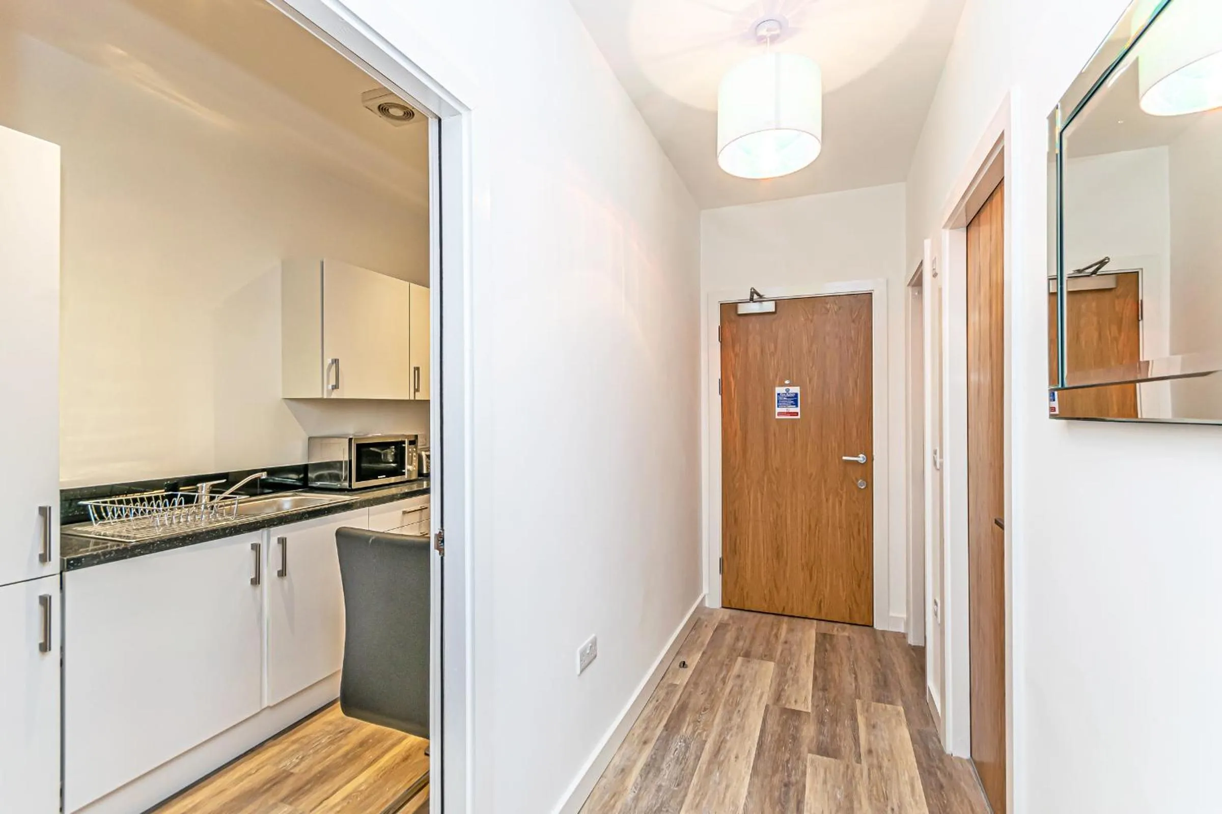 Kitchen or kitchenette in City Suites by Guestz