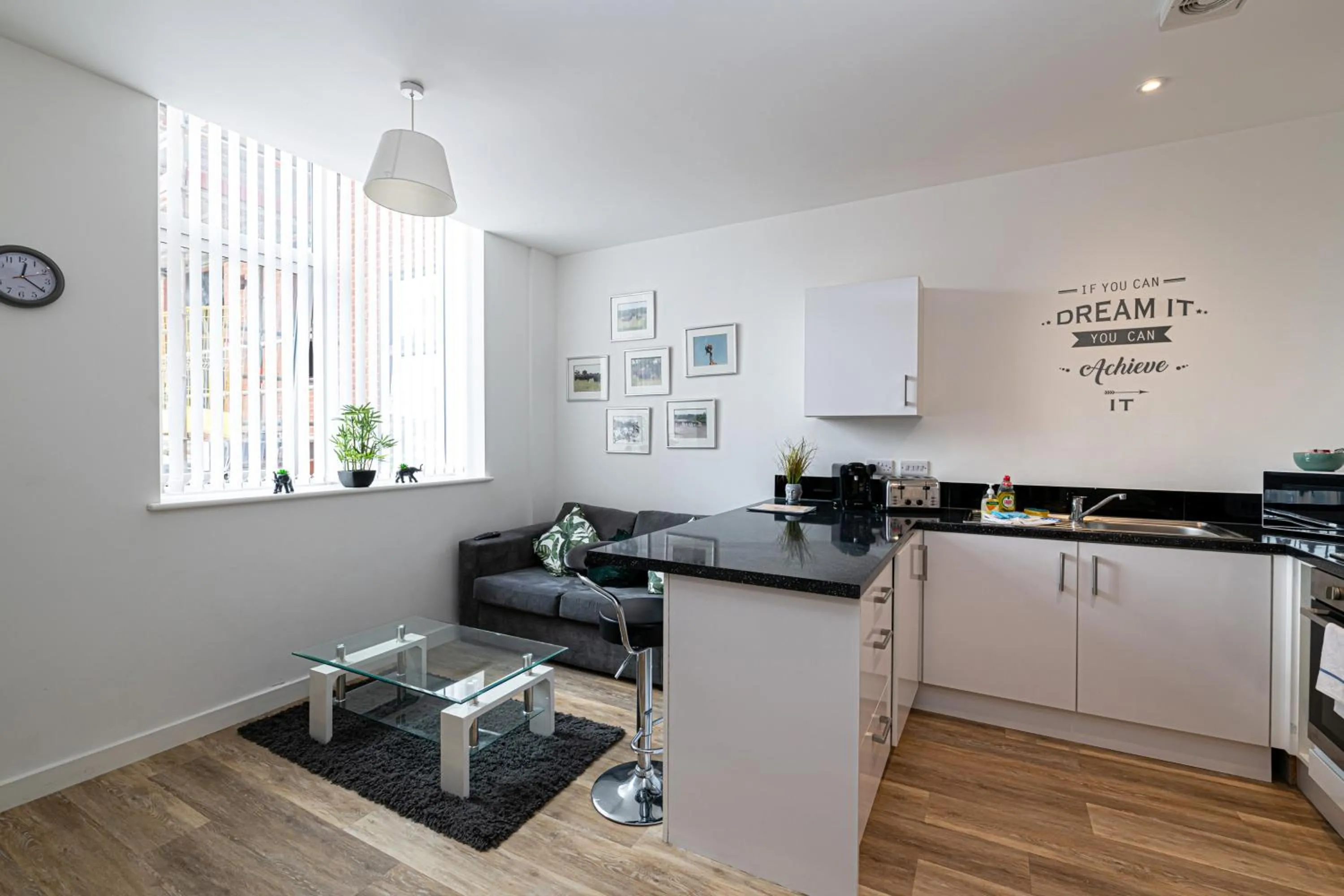 Kitchen or kitchenette in City Suites by Guestz