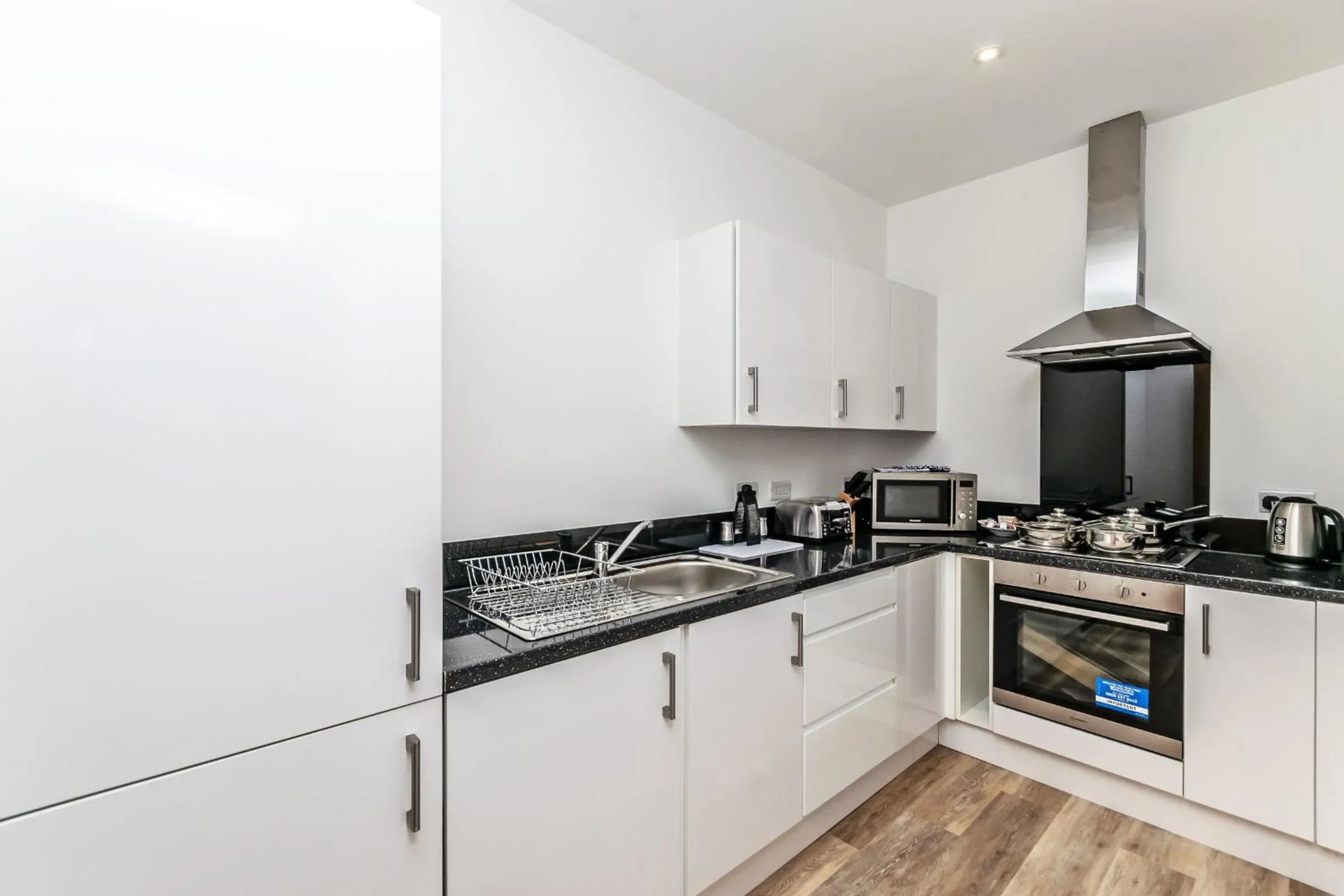 Kitchen or kitchenette in City Suites by Guestz