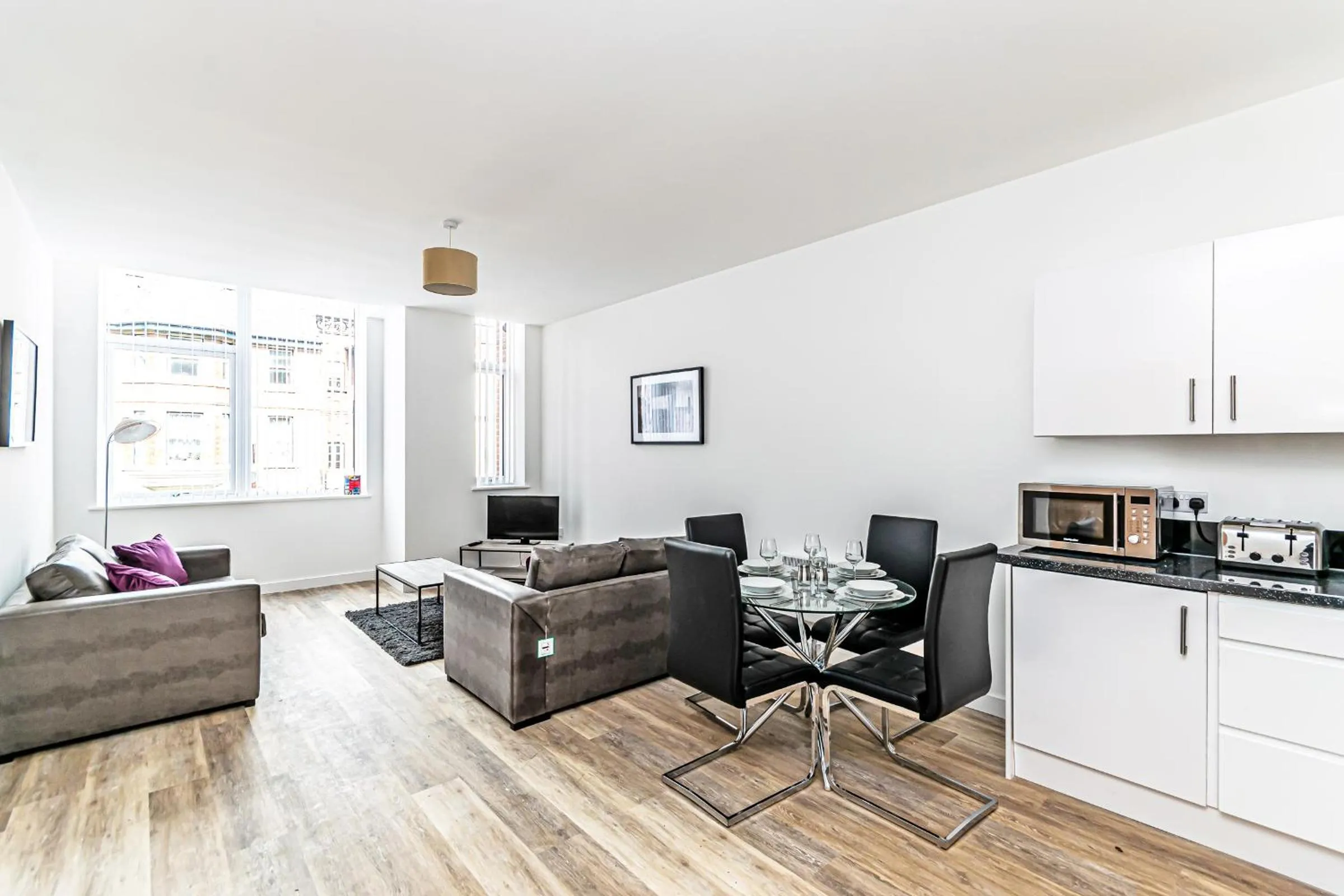 Kitchen or kitchenette in City Suites by Guestz