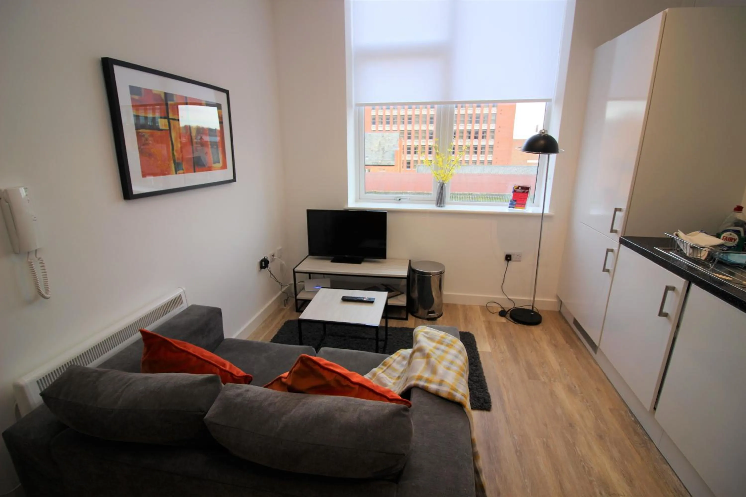 Kitchen or kitchenette in City Suites by Guestz
