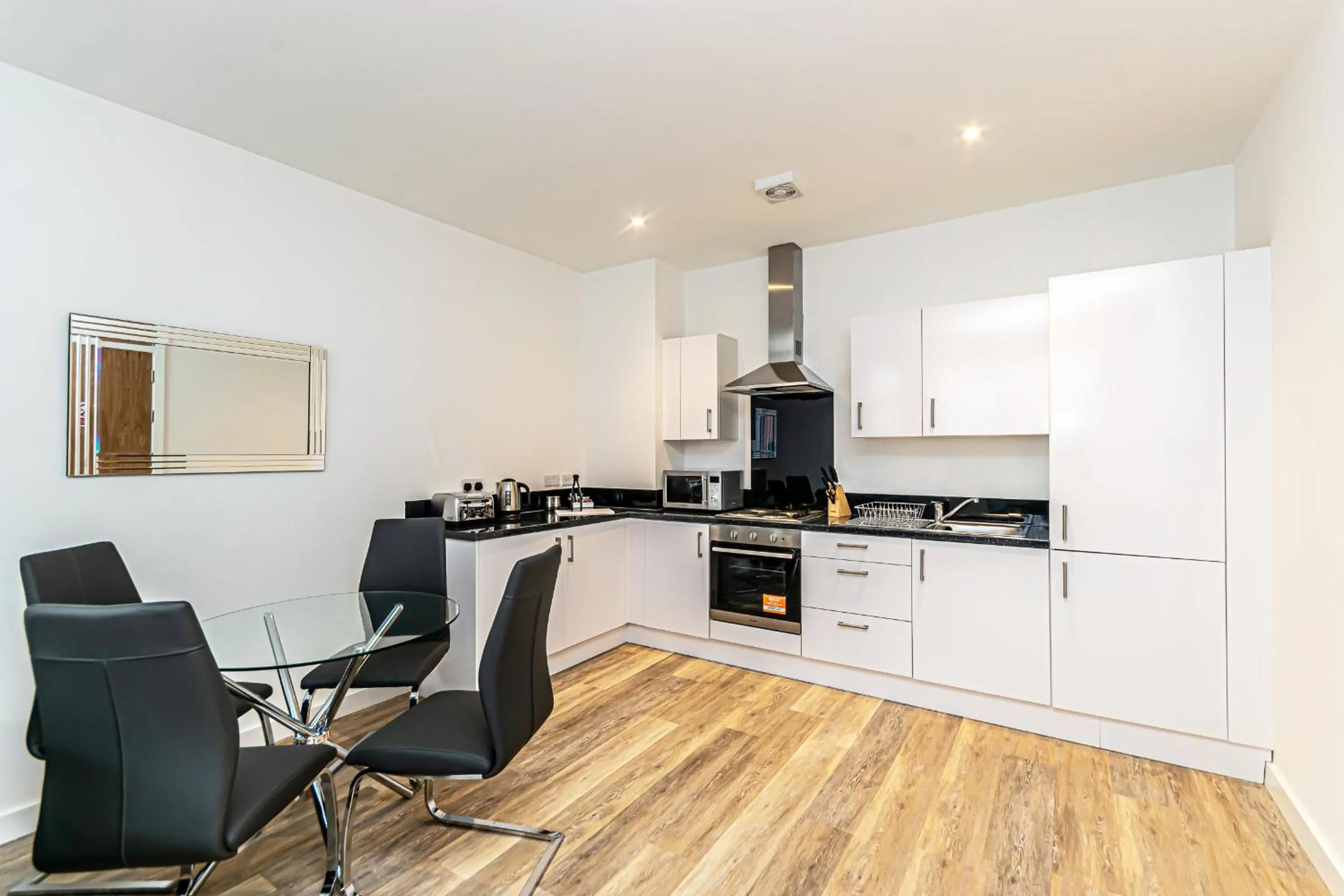 Kitchen or kitchenette in City Suites by Guestz