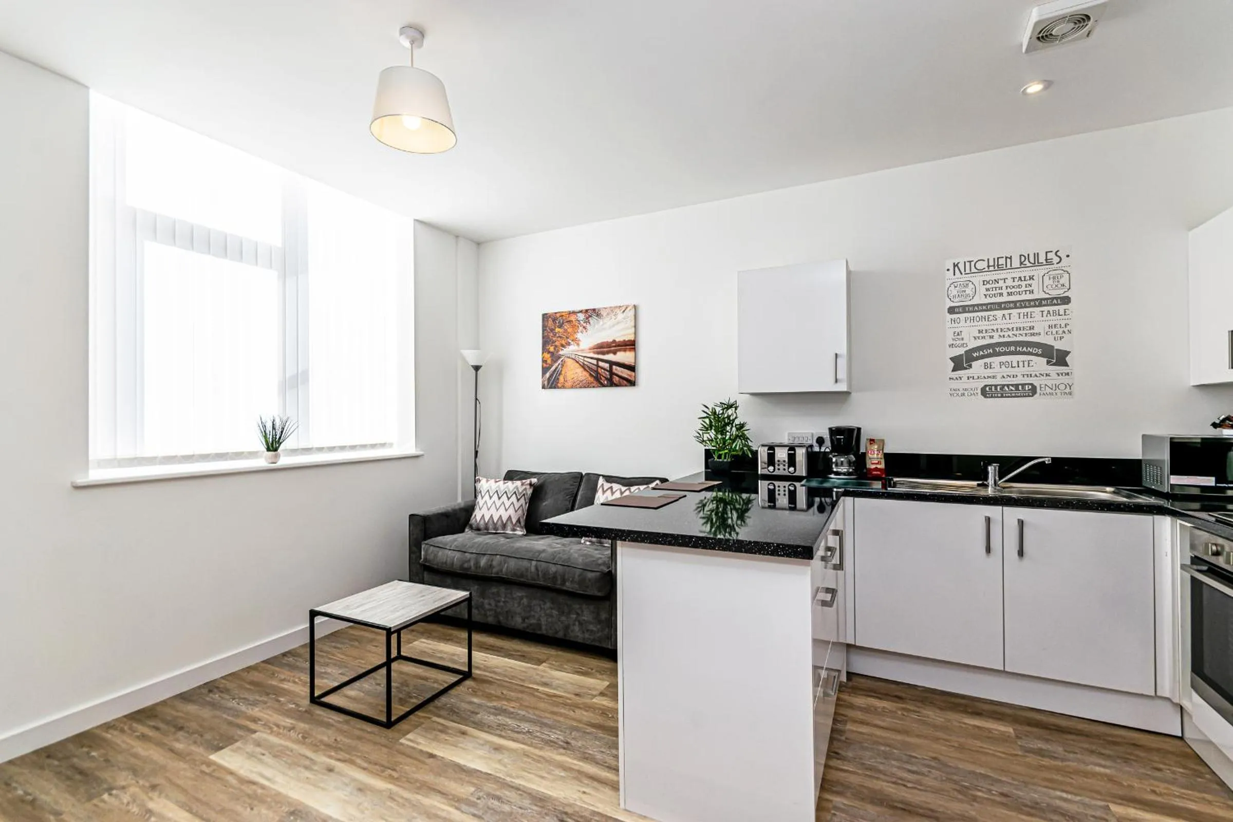 Kitchen or kitchenette in City Suites by Guestz