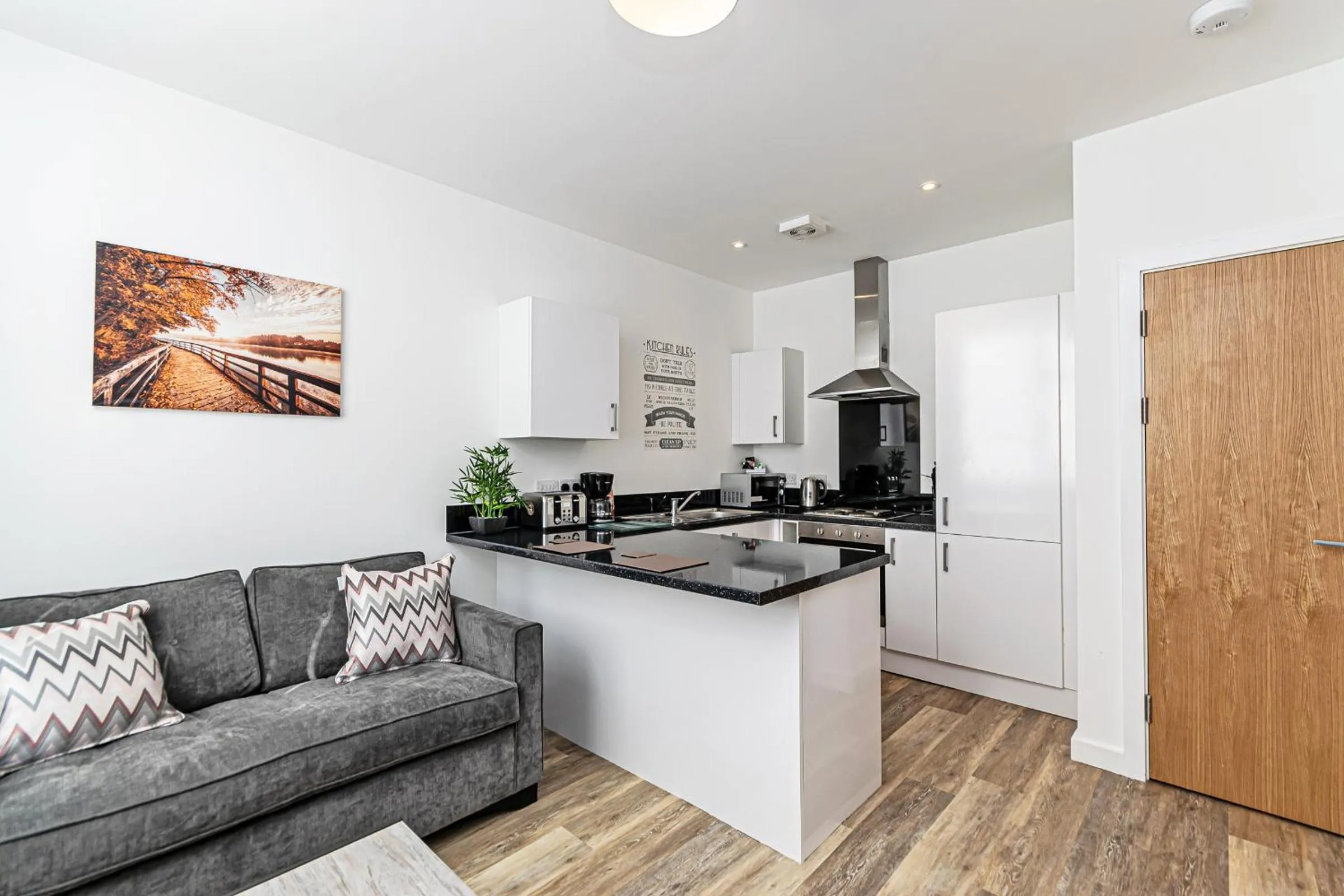 Kitchen or kitchenette in City Suites by Guestz