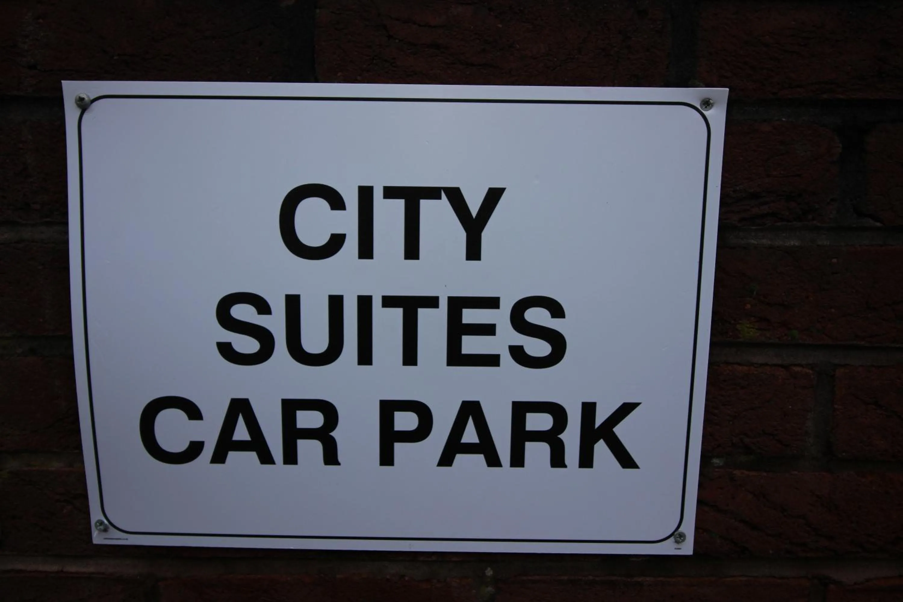 Property logo or sign in City Suites by Guestz