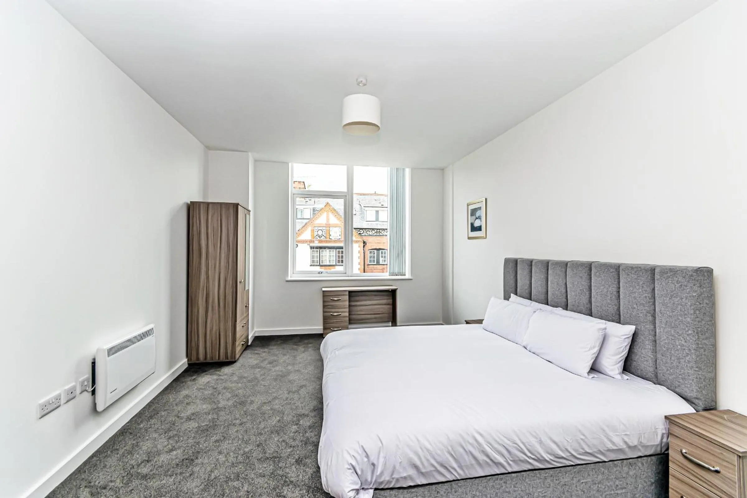 Photo of the whole room, Bed in City Suites by Guestz