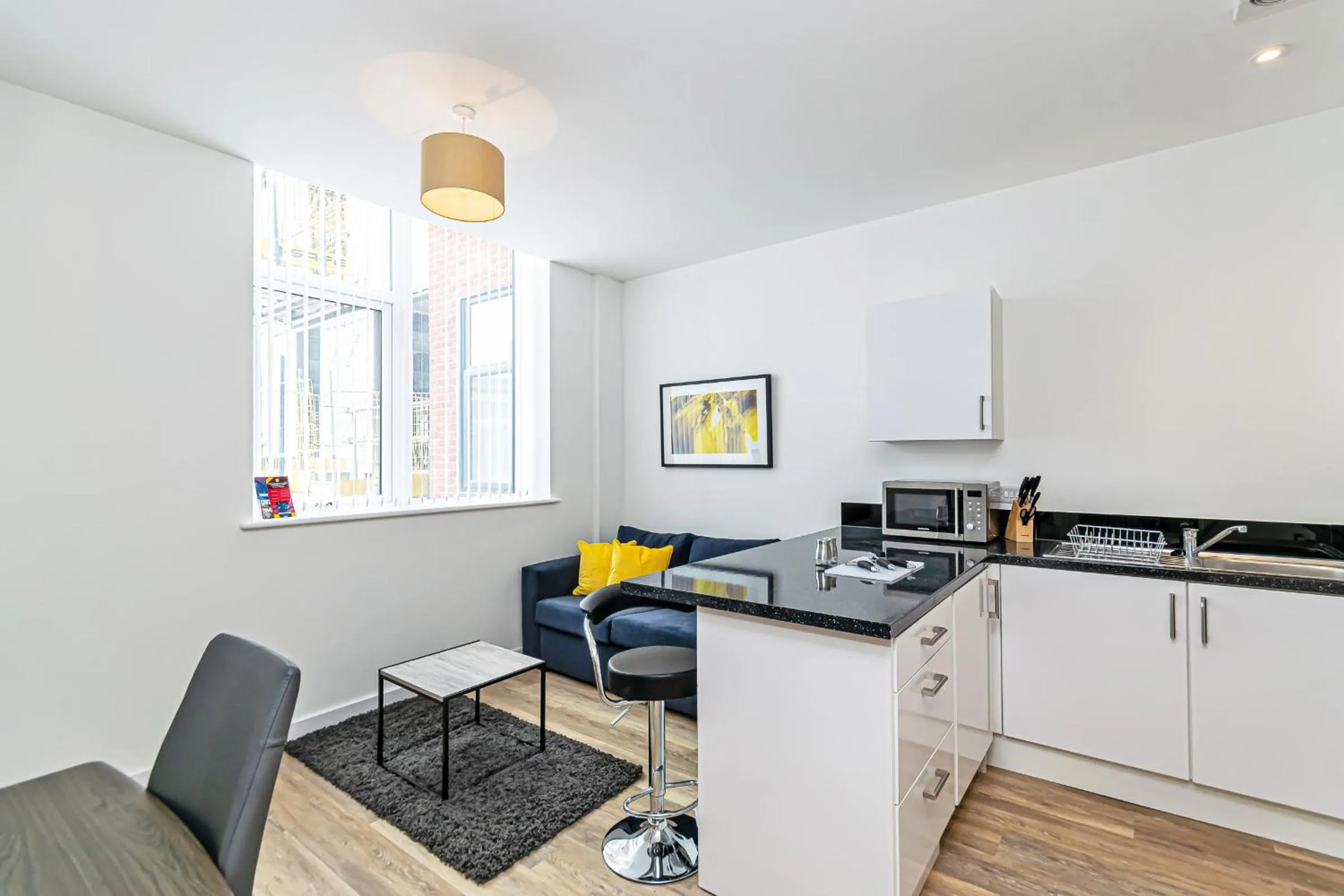 Kitchen or kitchenette in City Suites by Guestz
