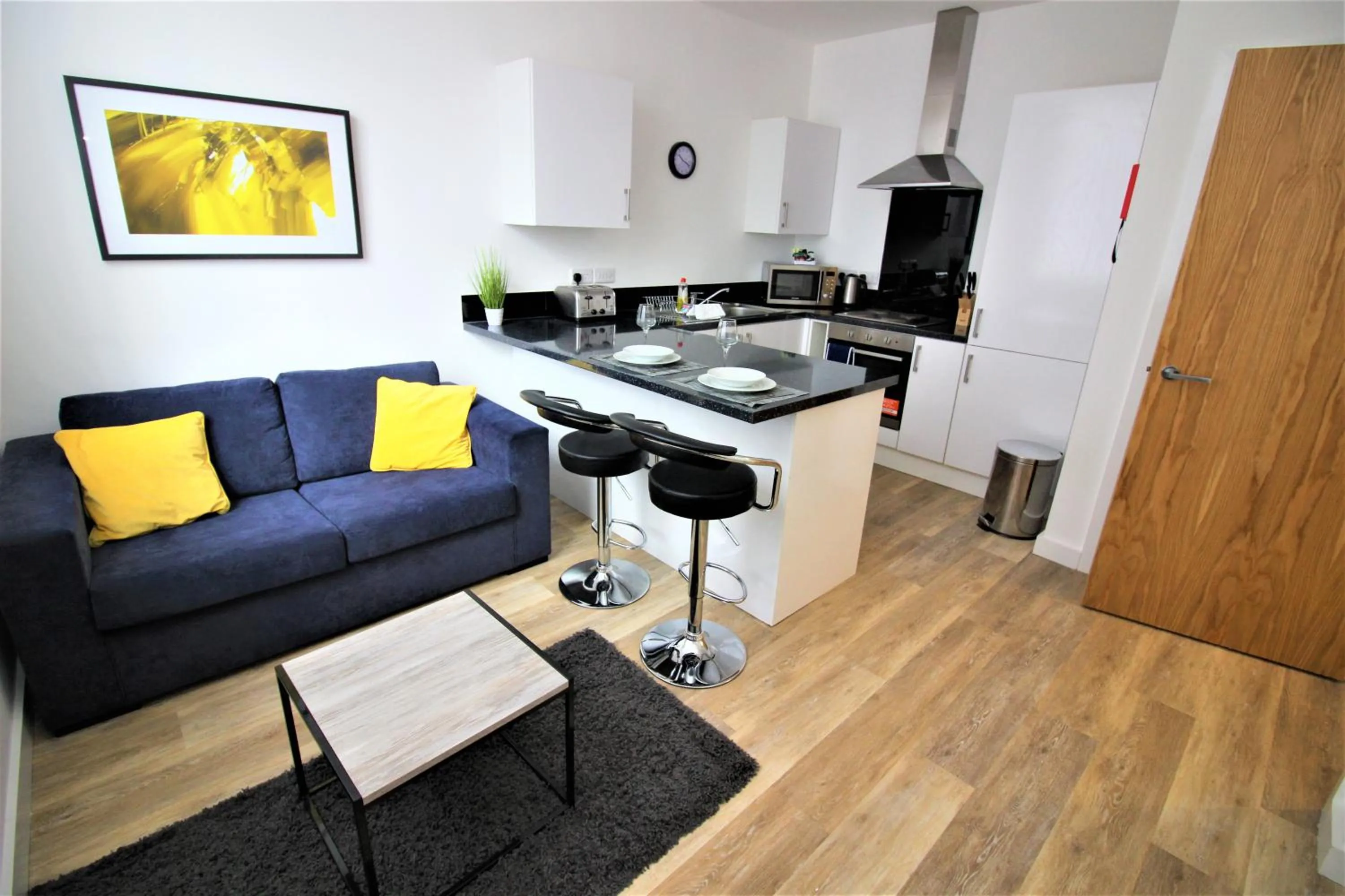 Kitchen or kitchenette in City Suites by Guestz