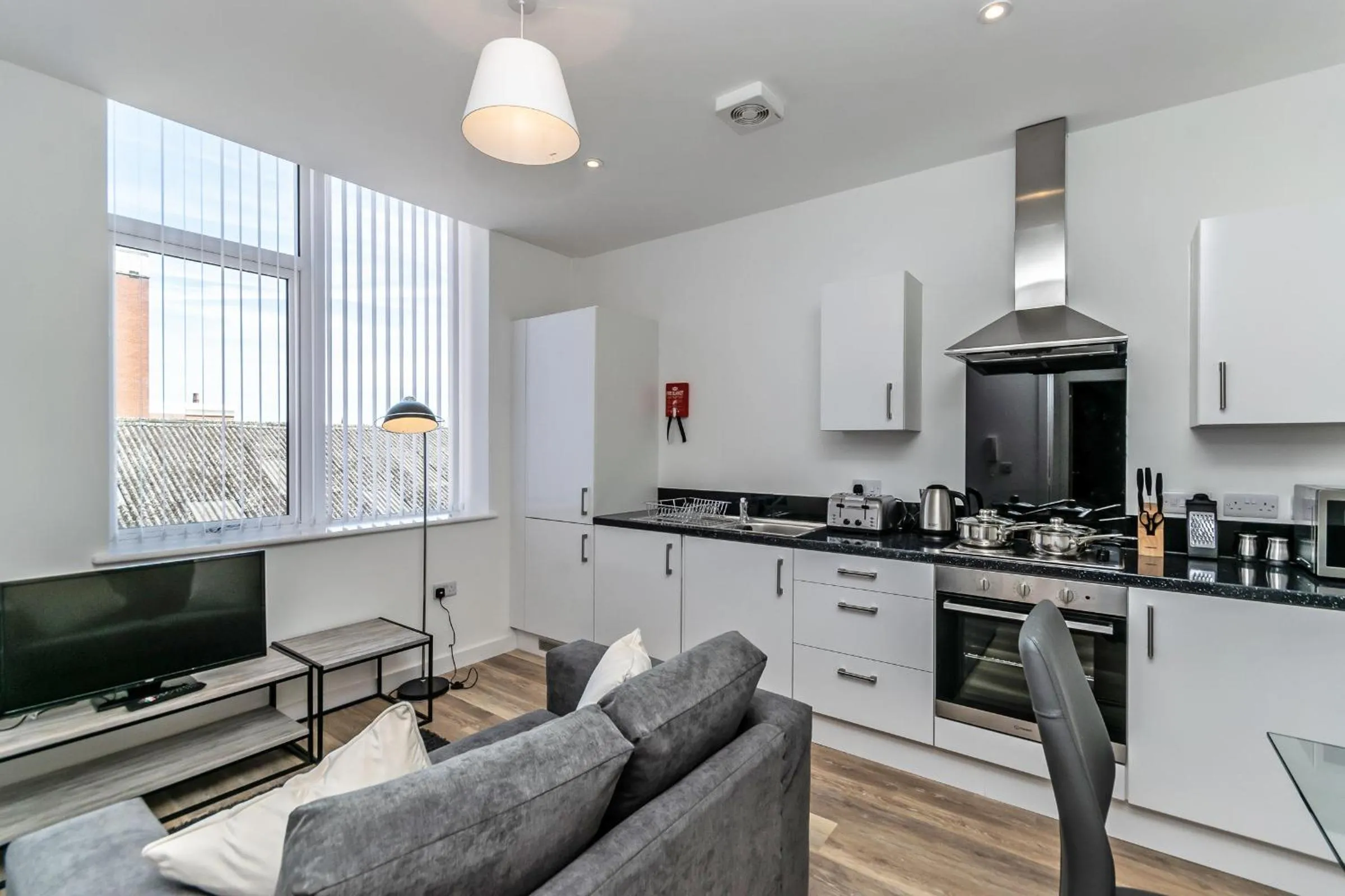 Kitchen or kitchenette in City Suites by Guestz