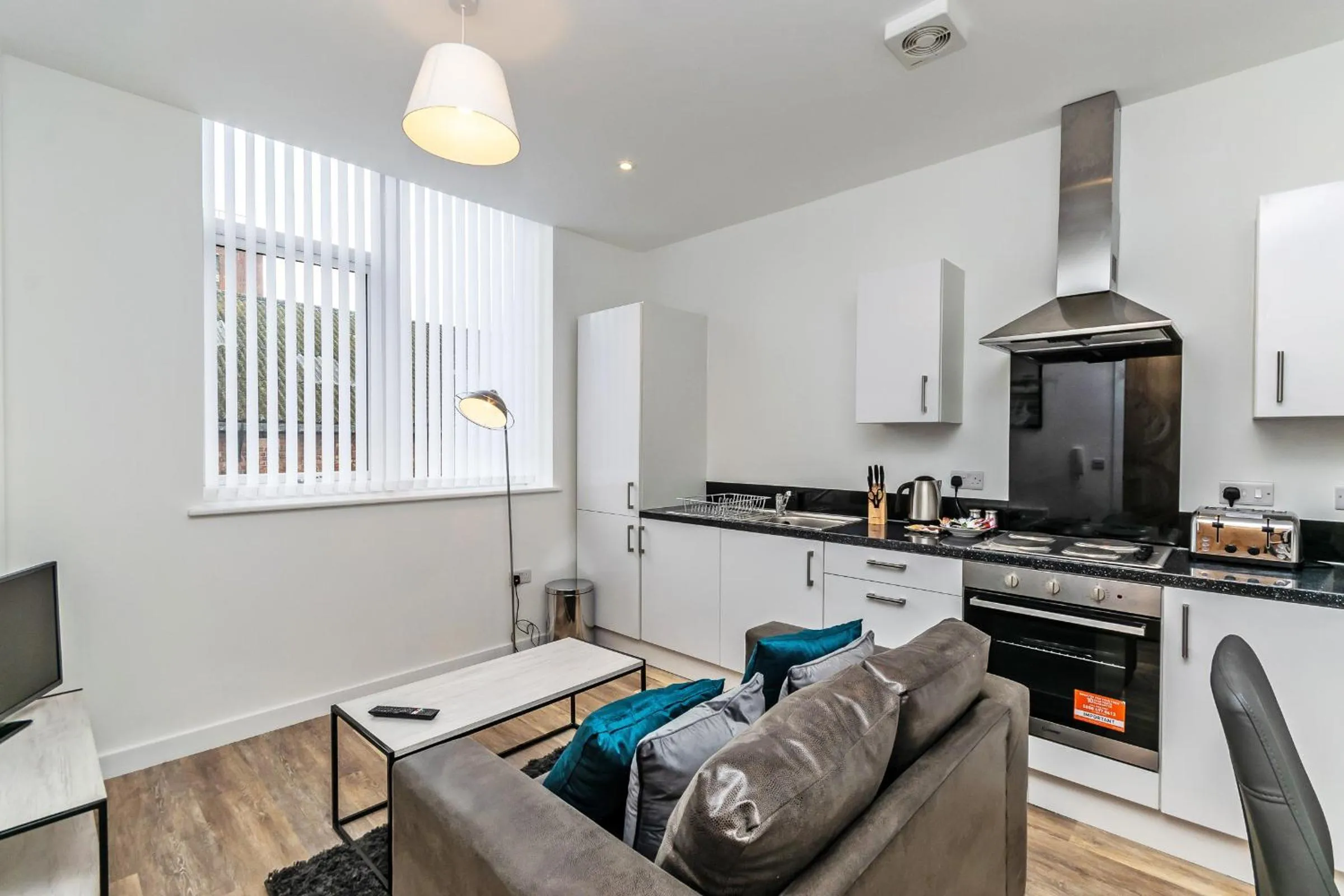 Kitchen or kitchenette in City Suites by Guestz